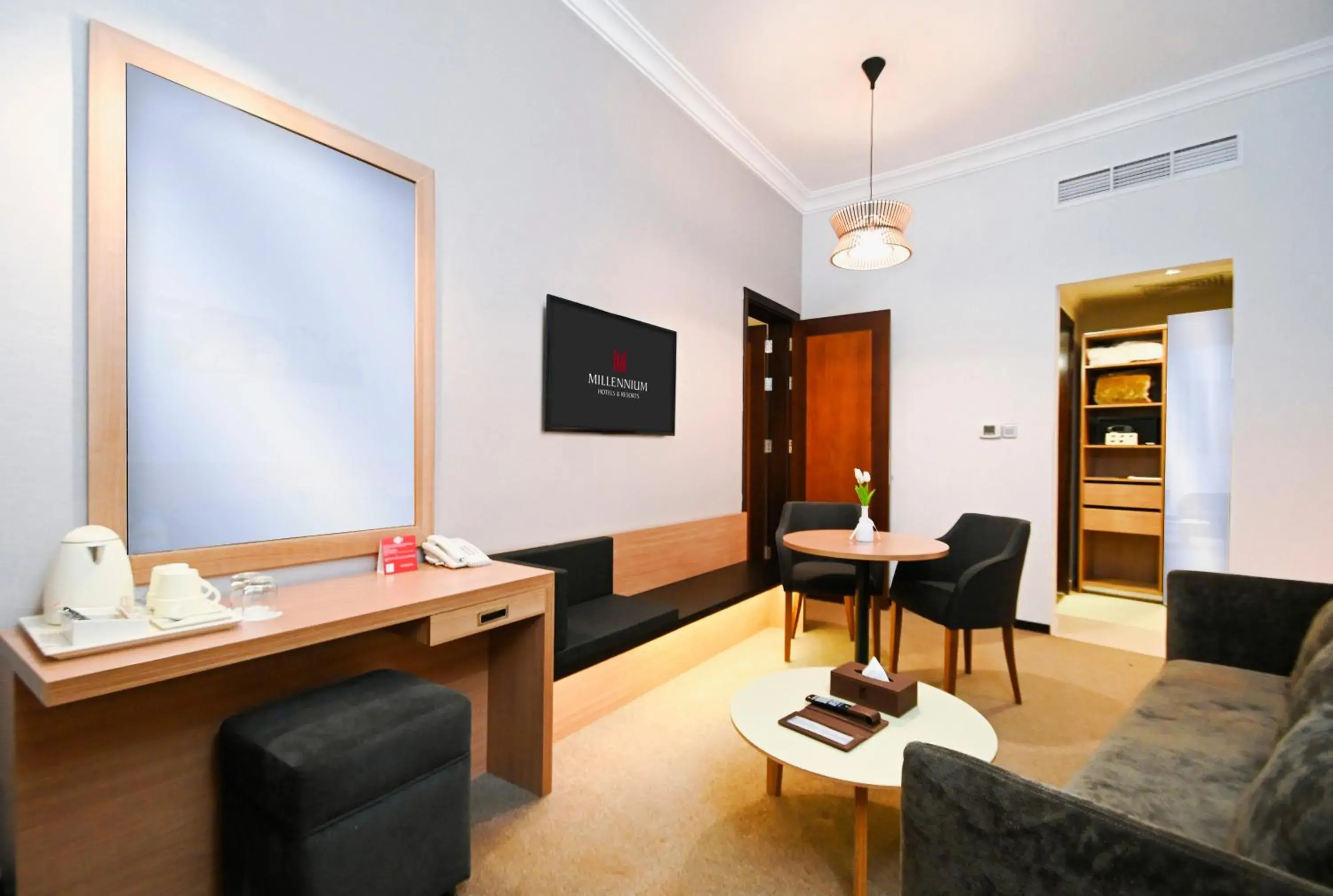 Living room in M Hotel Al Dana Makkah by Millennium Living room in M Hotel Al Dana Makkah by Millennium