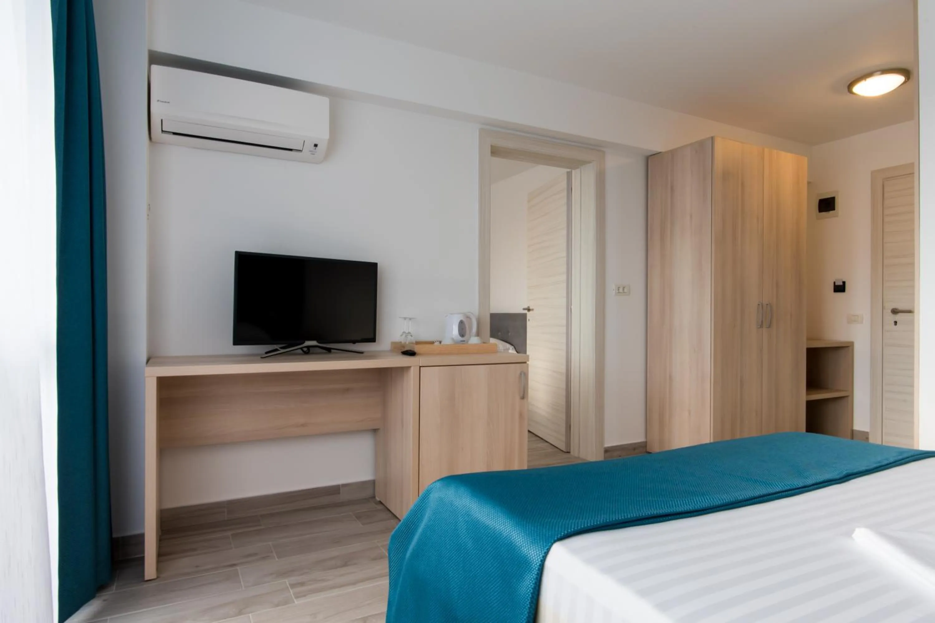 Bed in Turquoise Boutique