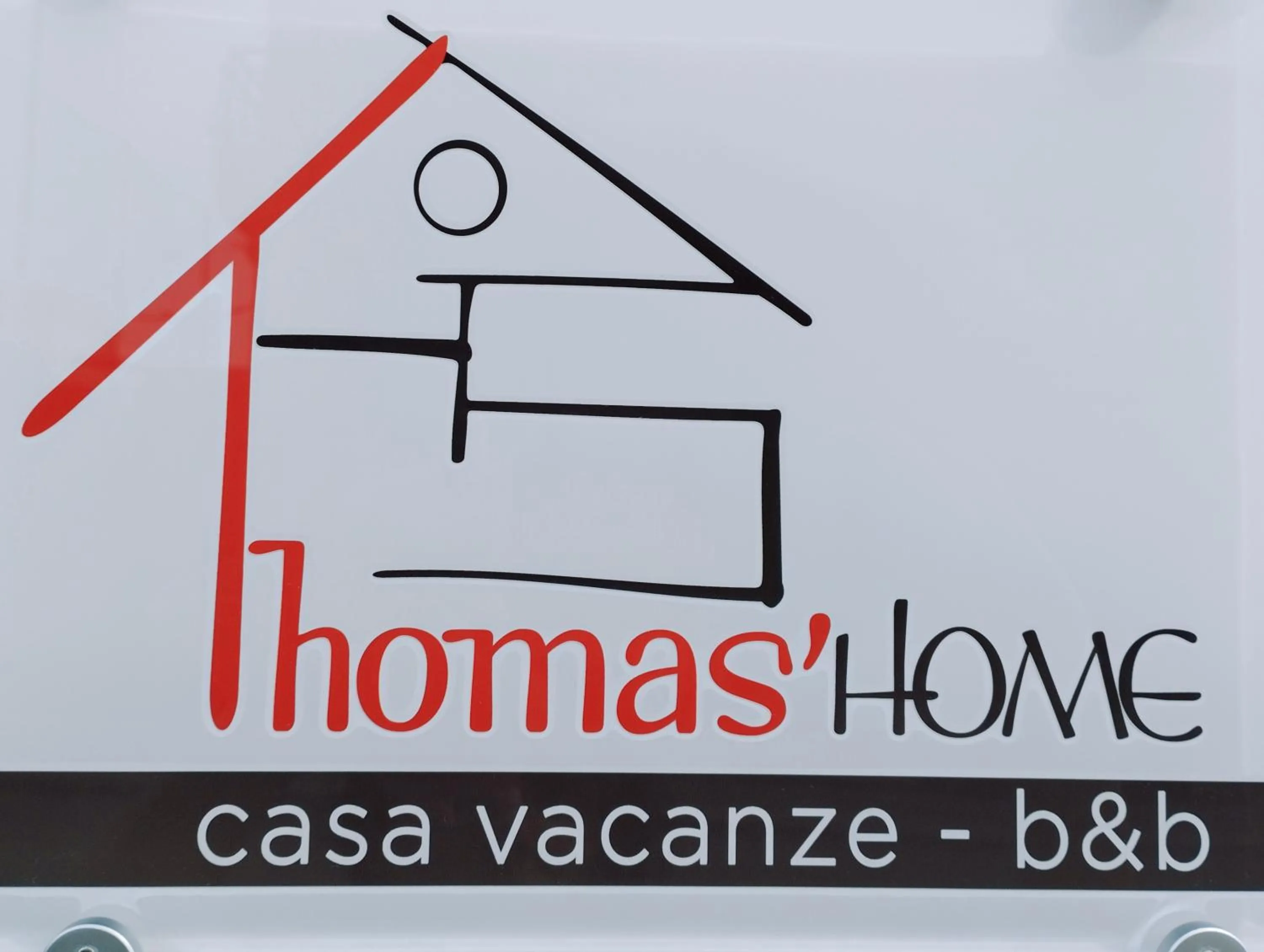 Property logo or sign in Thomas'home