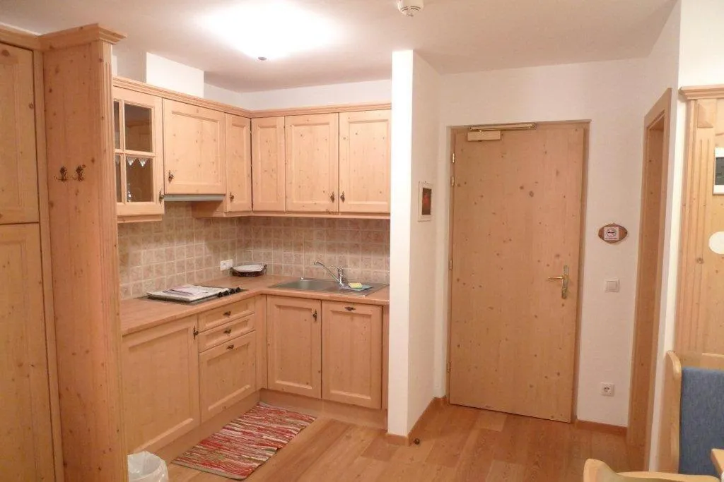 Kitchen or kitchenette in Family and Wellness Residence Ciasa Antersies