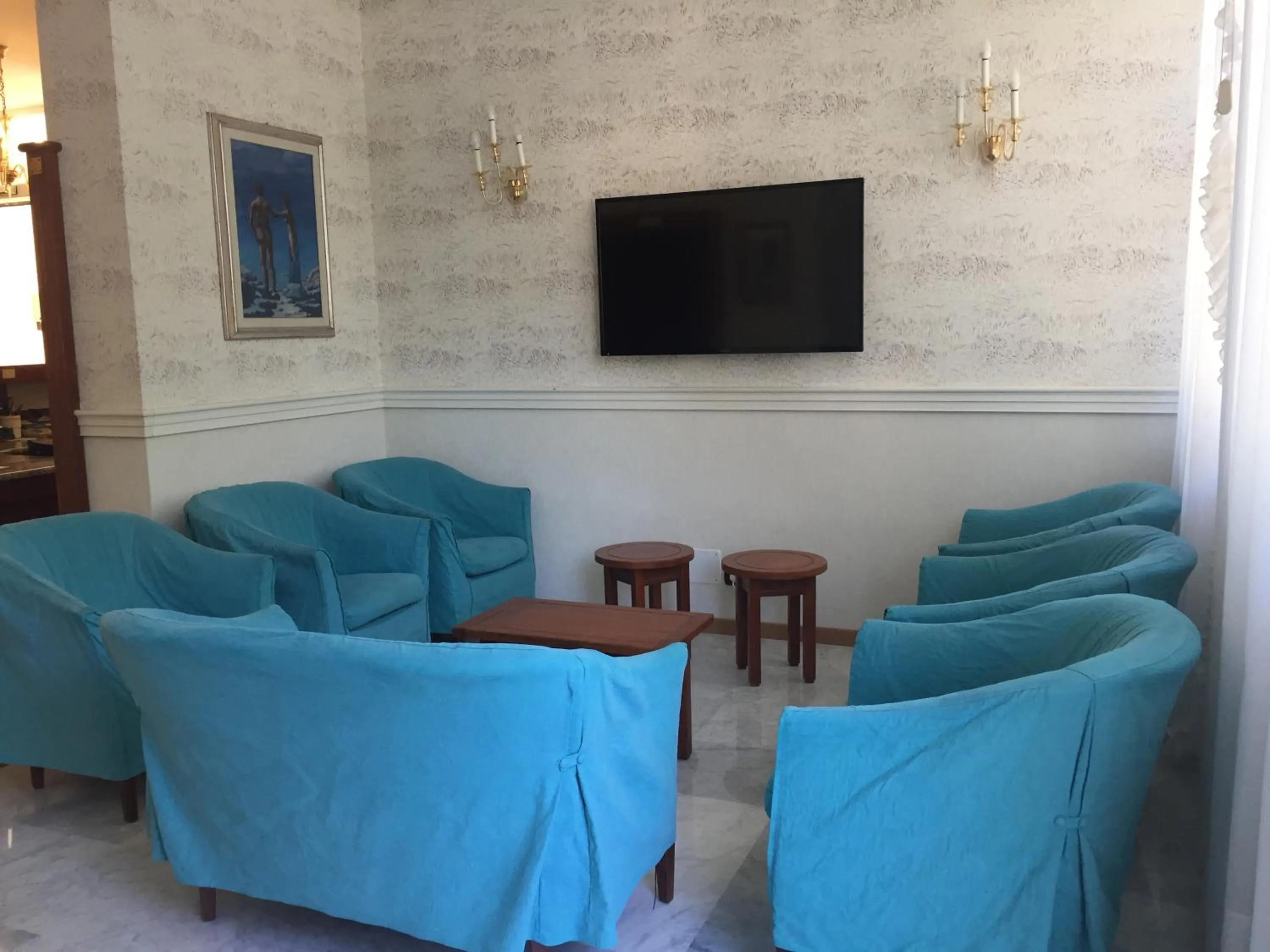 Communal lounge/ TV room in Hotel Consuelo