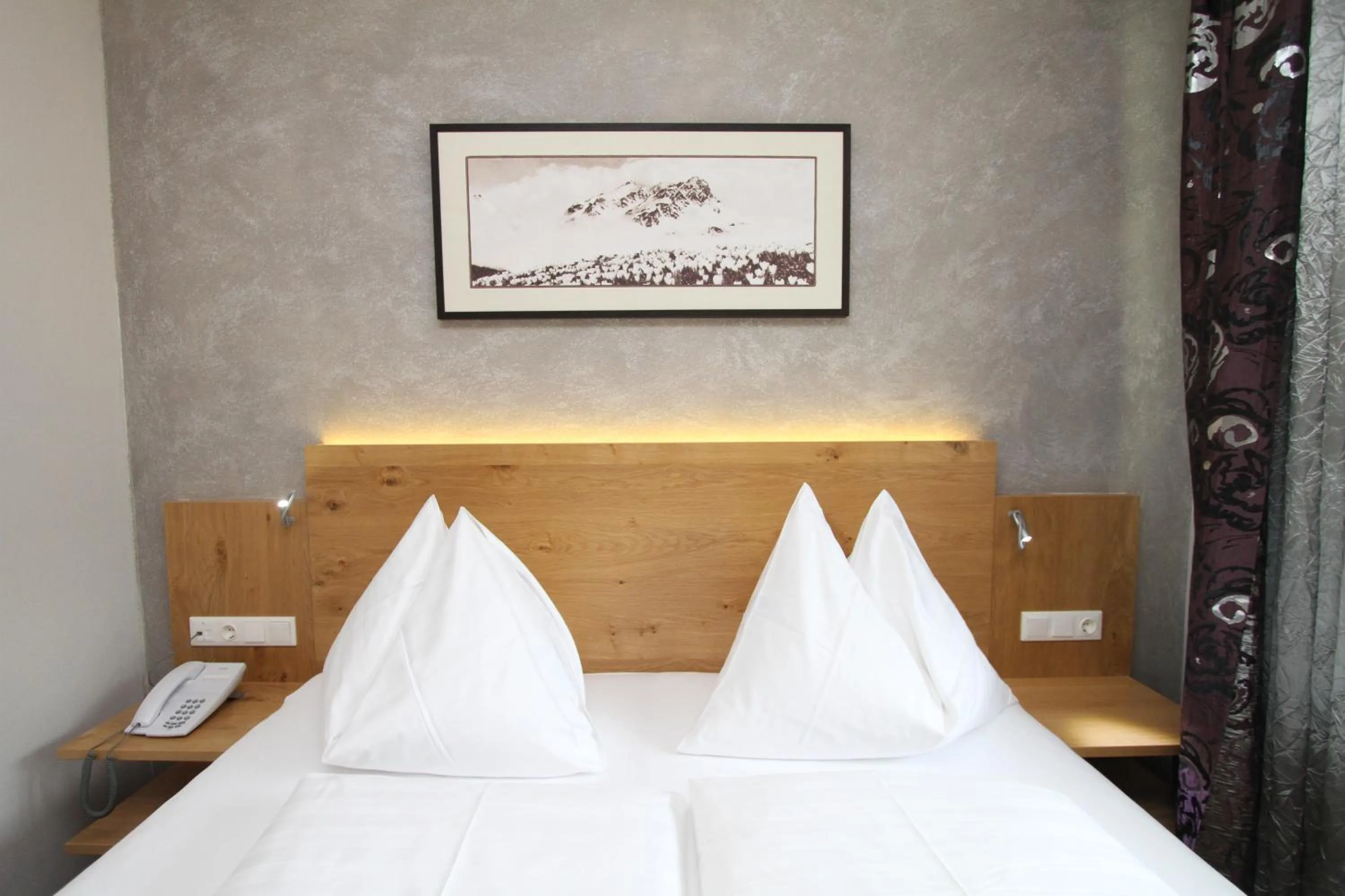 Bed in Hotel Almrausch