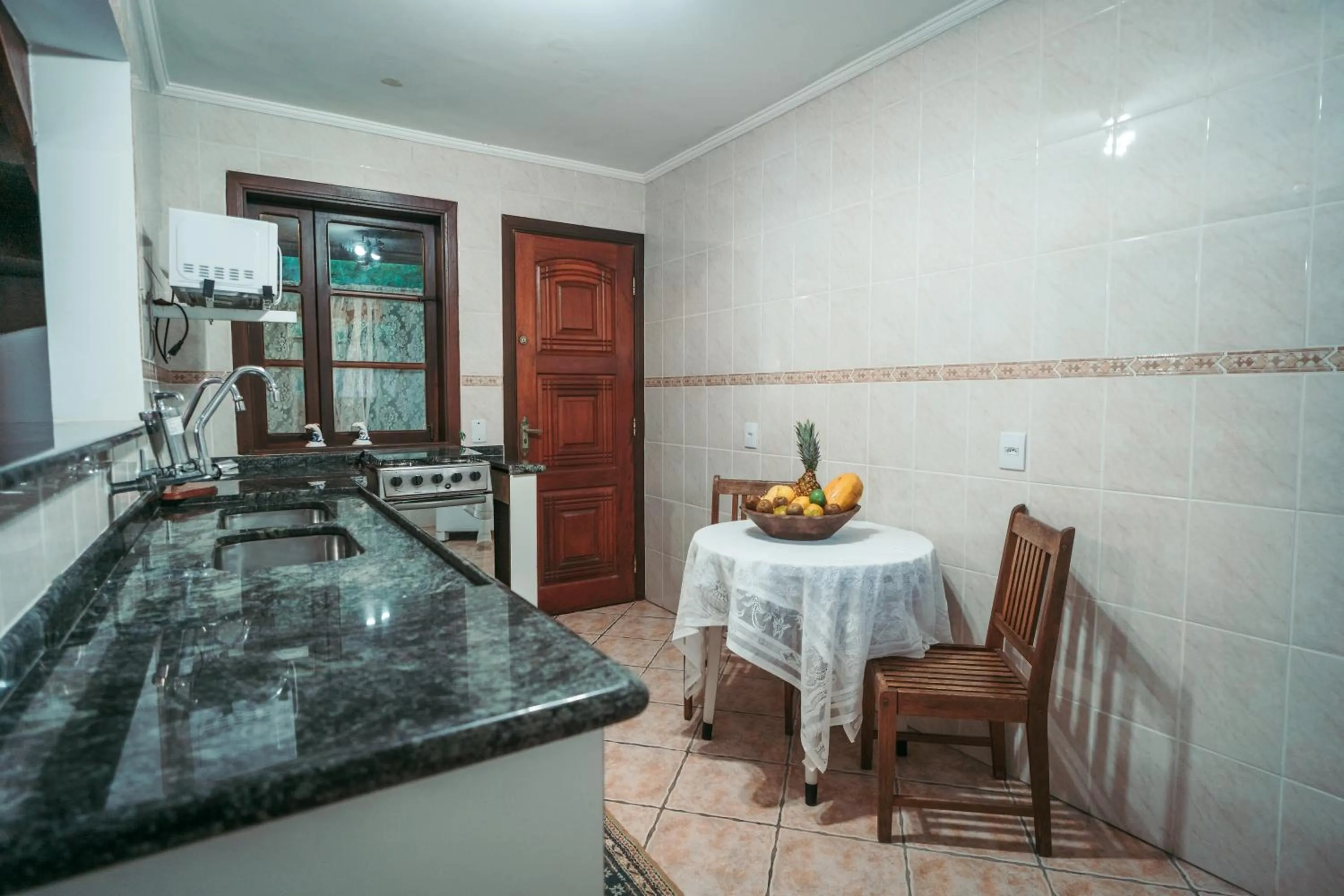 Kitchen or kitchenette in Pousada Villa Atlântica