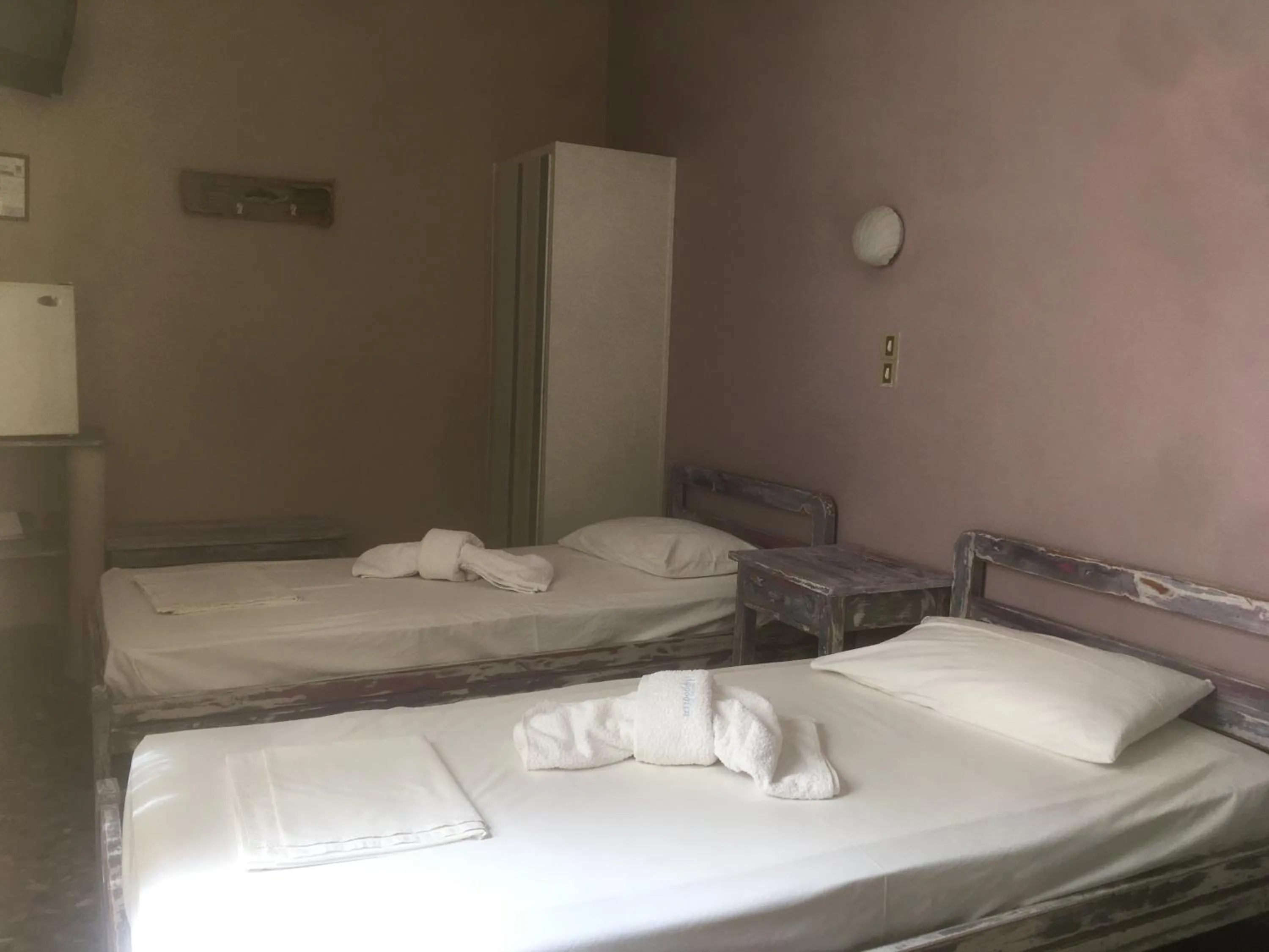 Bed in Afrodite Hotel