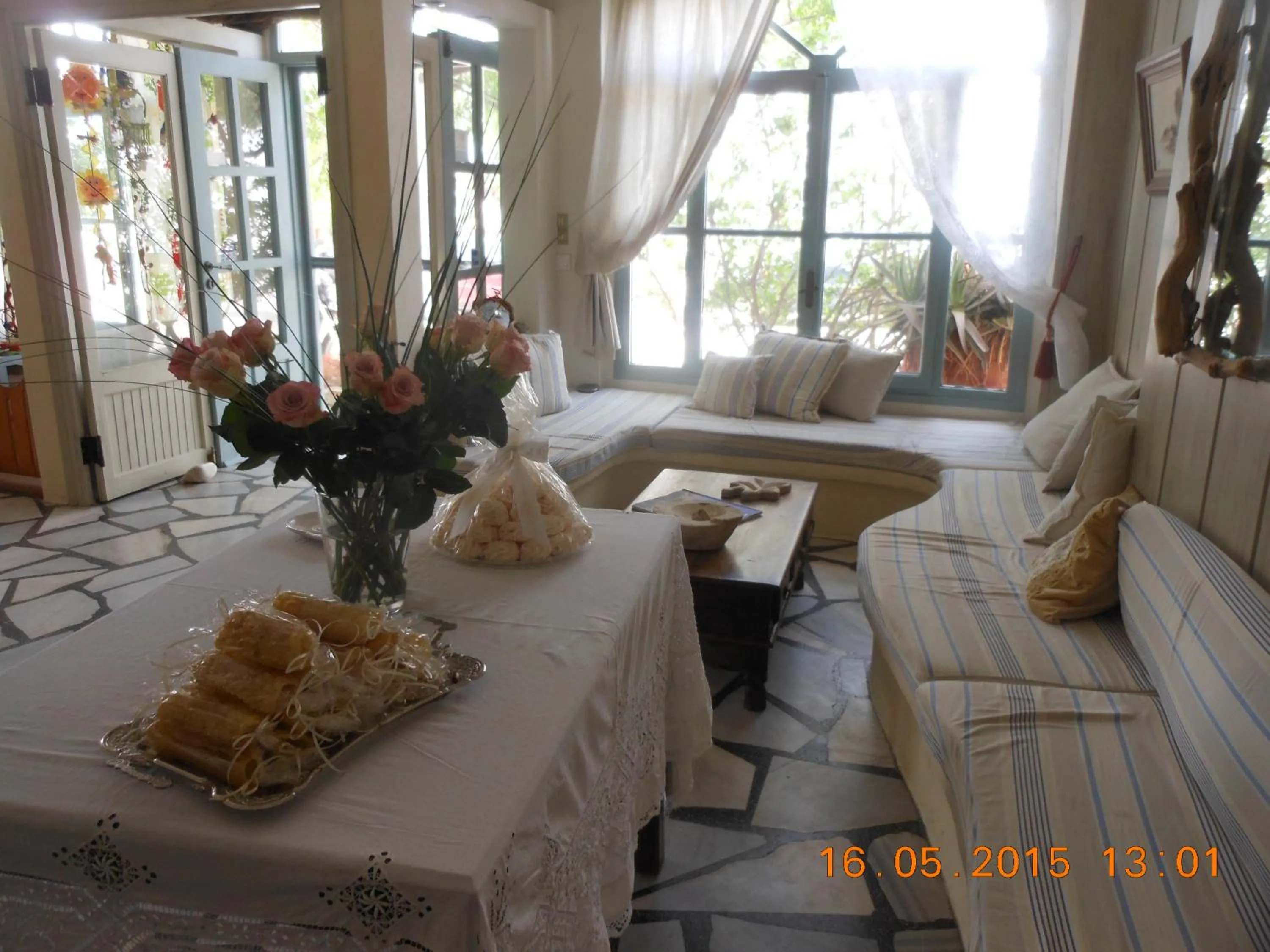 Communal lounge/ TV room, Bed in Afrodite Hotel