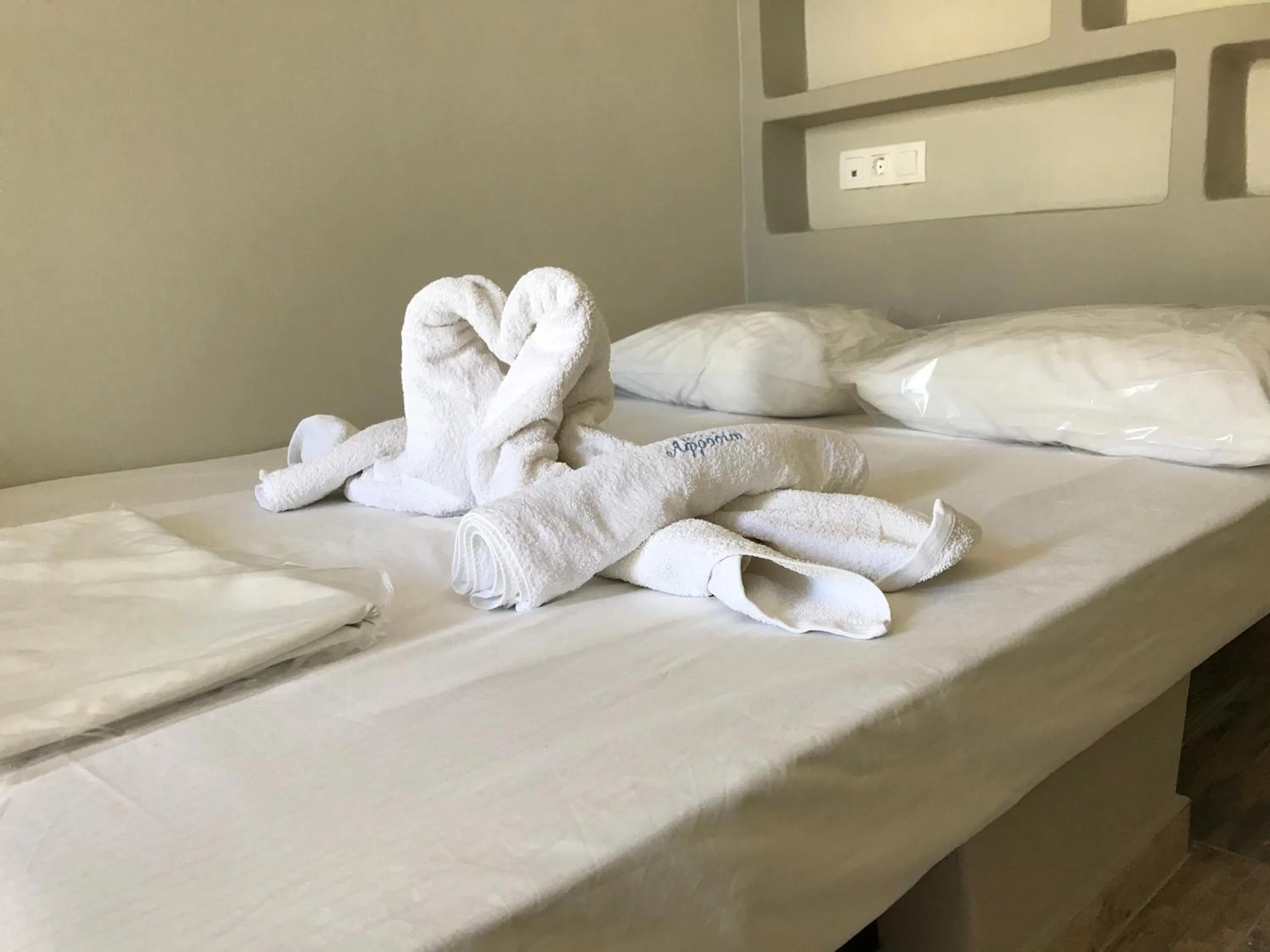 Bed in Afrodite Hotel