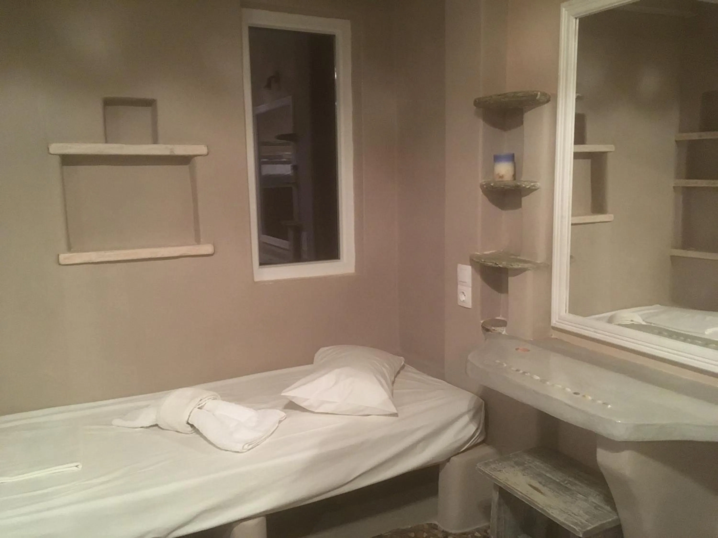 Bed in Afrodite Hotel