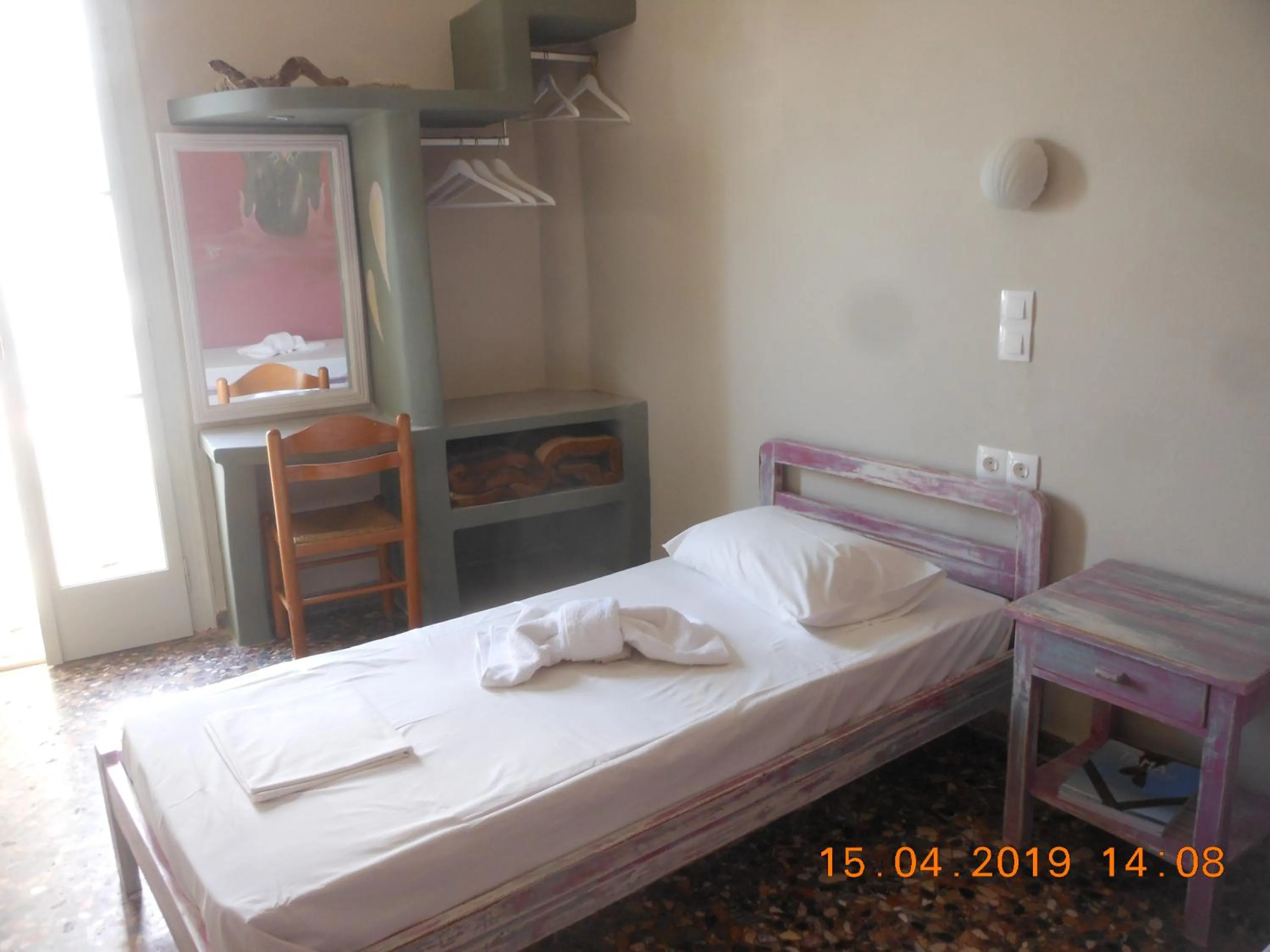 Bed in Afrodite Hotel