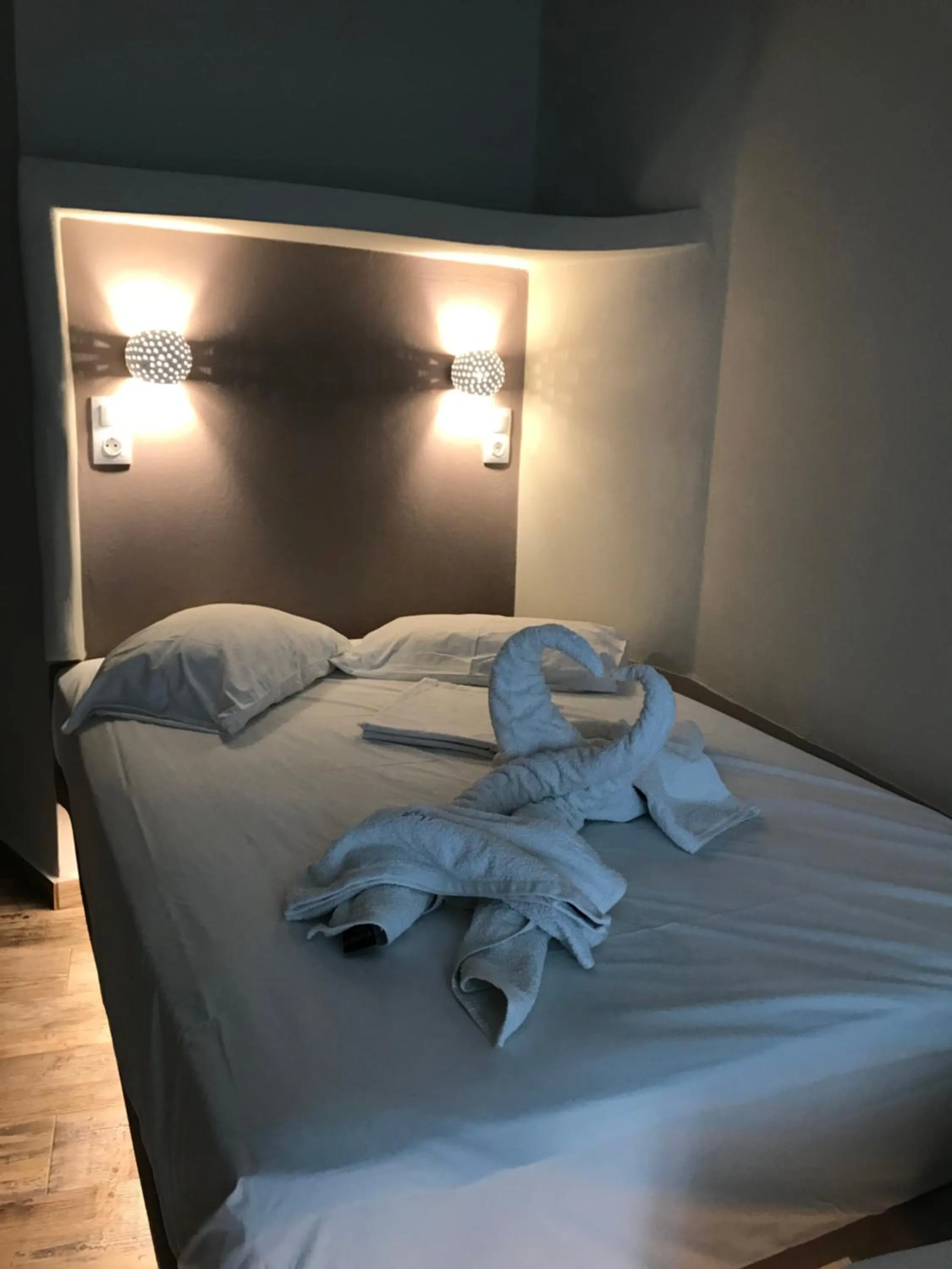 Bed in Afrodite Hotel