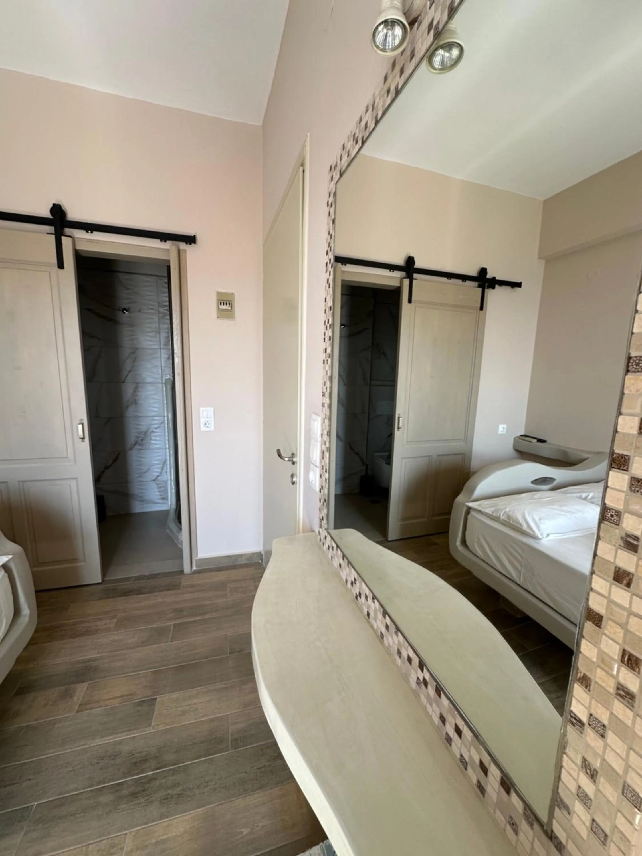 Bed in Afrodite Hotel