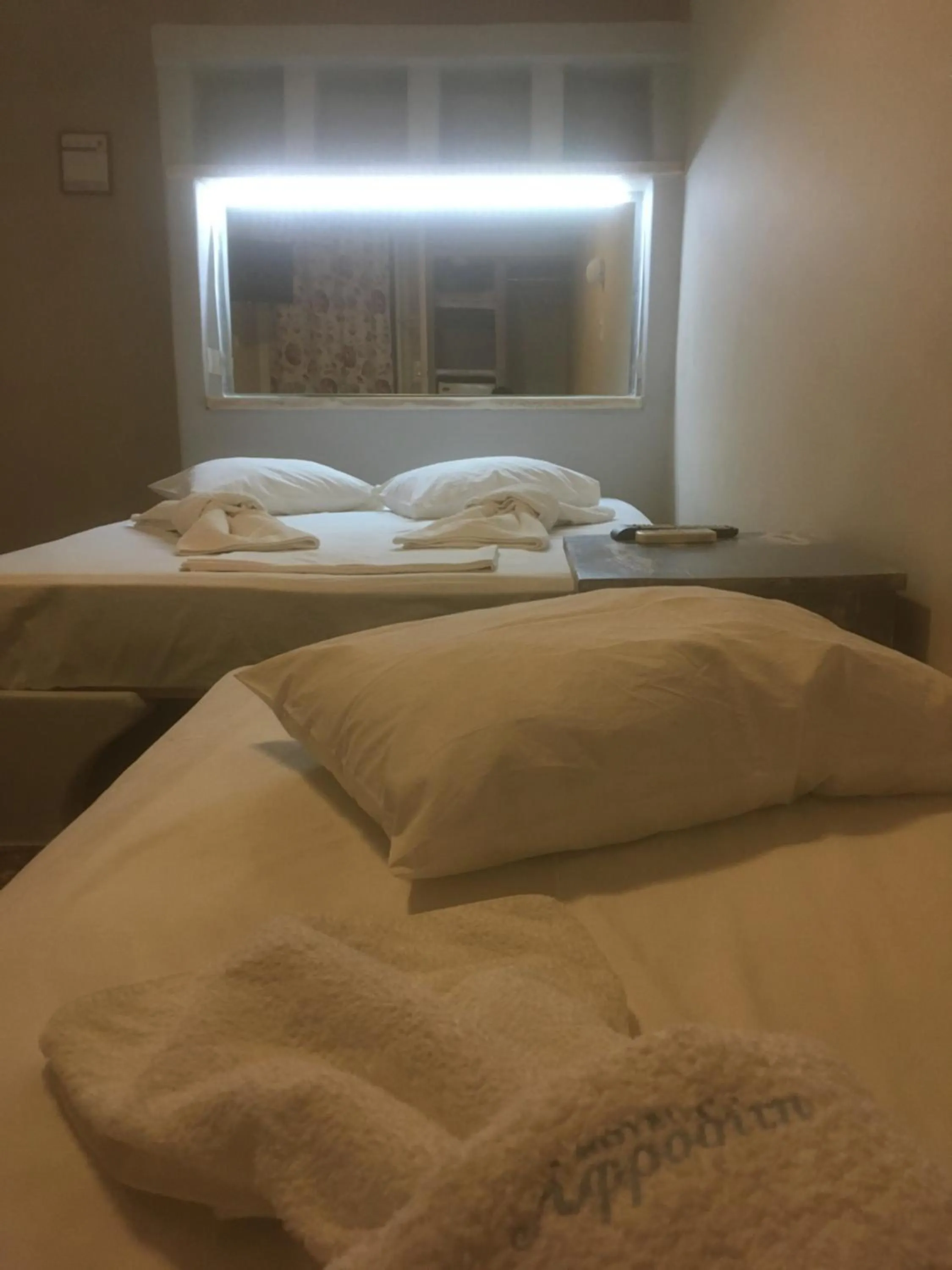 Bed in Afrodite Hotel