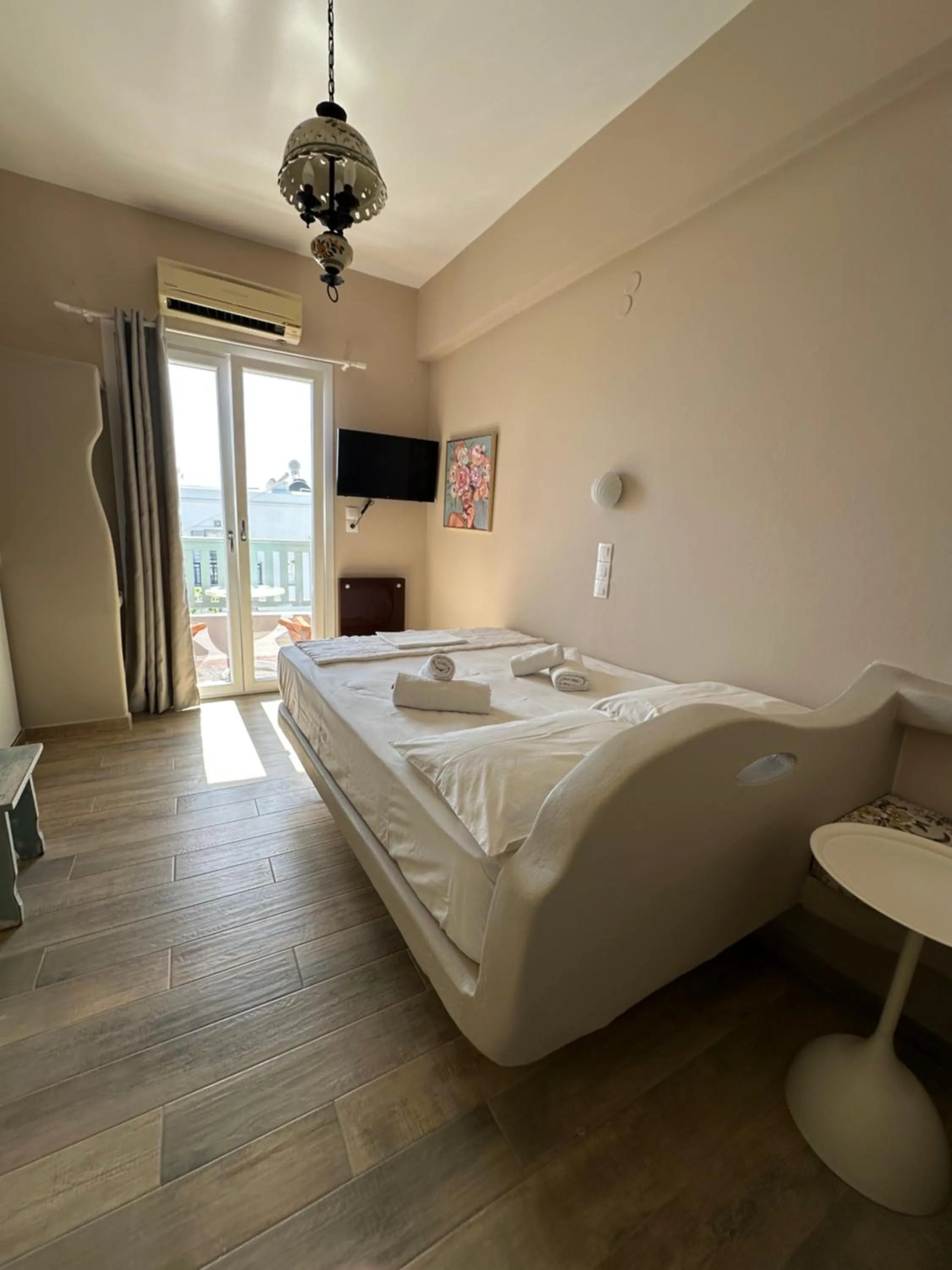 Bed in Afrodite Hotel