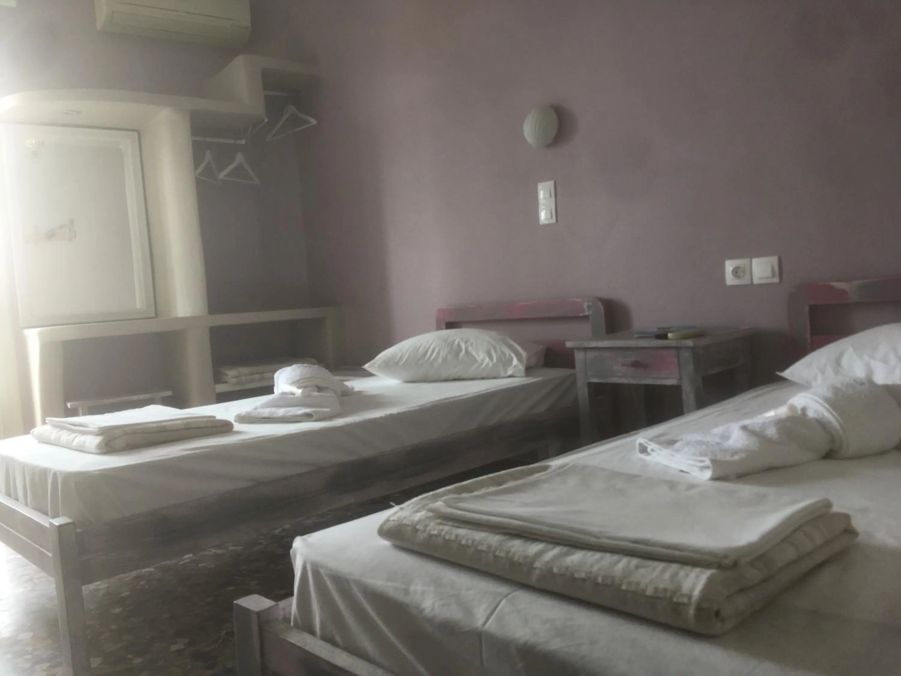 Bed in Afrodite Hotel
