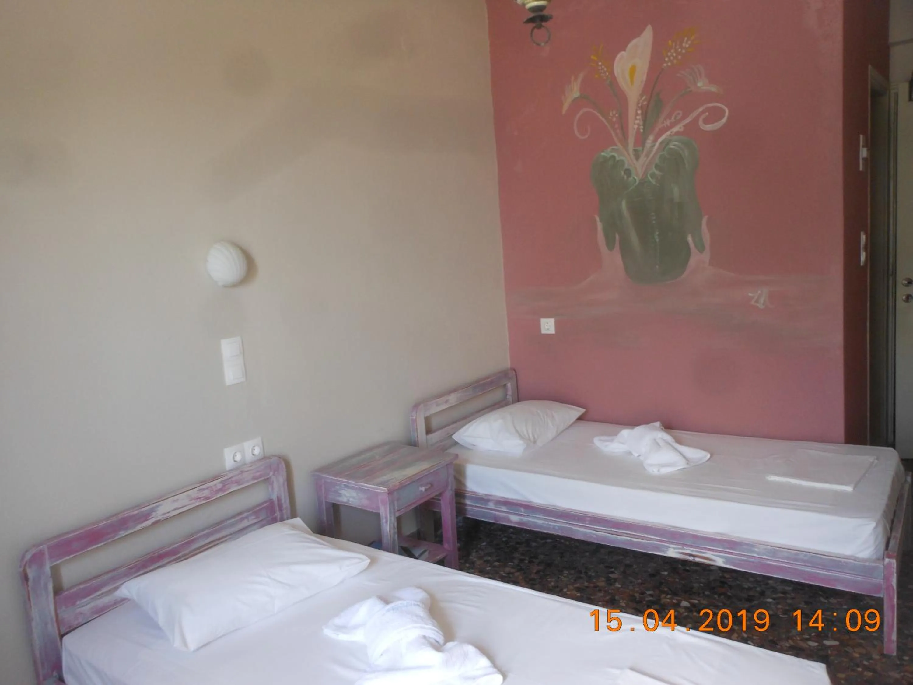 Bed in Afrodite Hotel