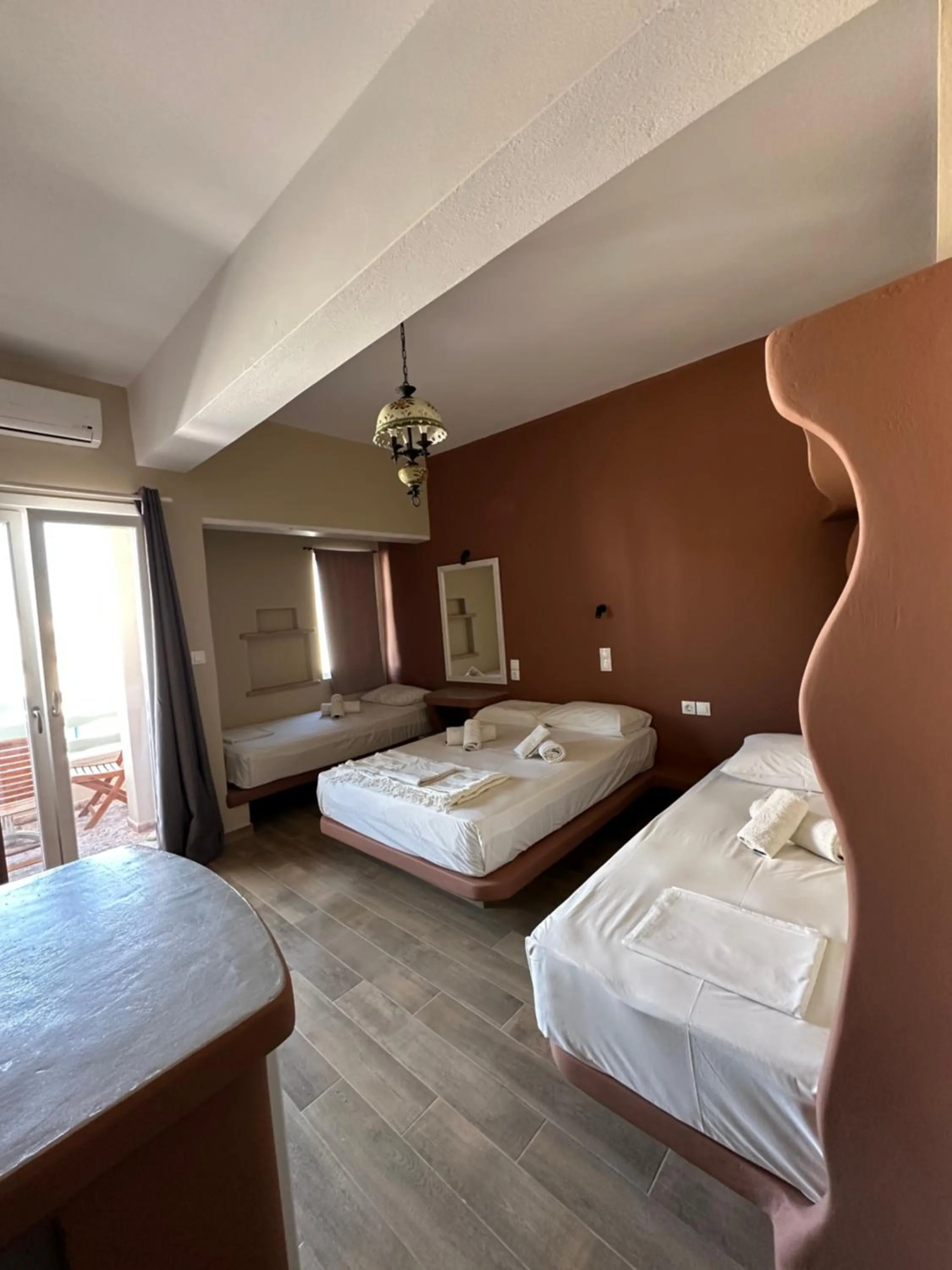 Bed in Afrodite Hotel