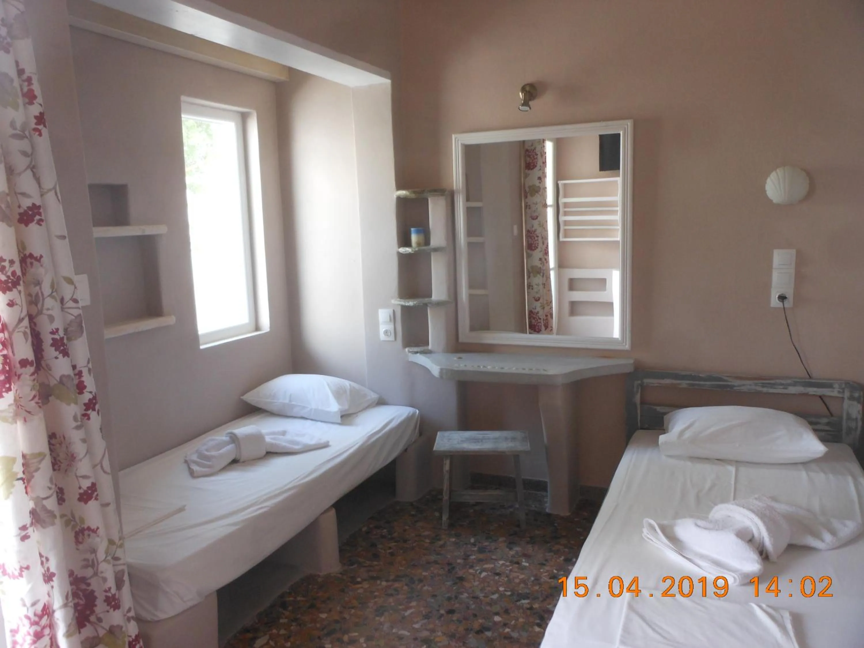 Bed in Afrodite Hotel