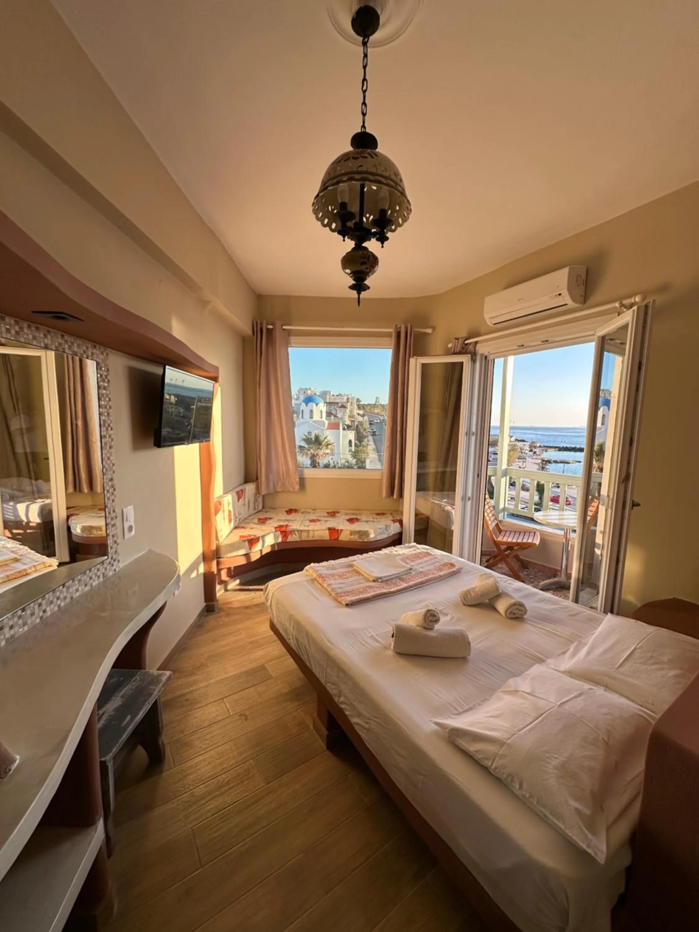 Bed in Afrodite Hotel