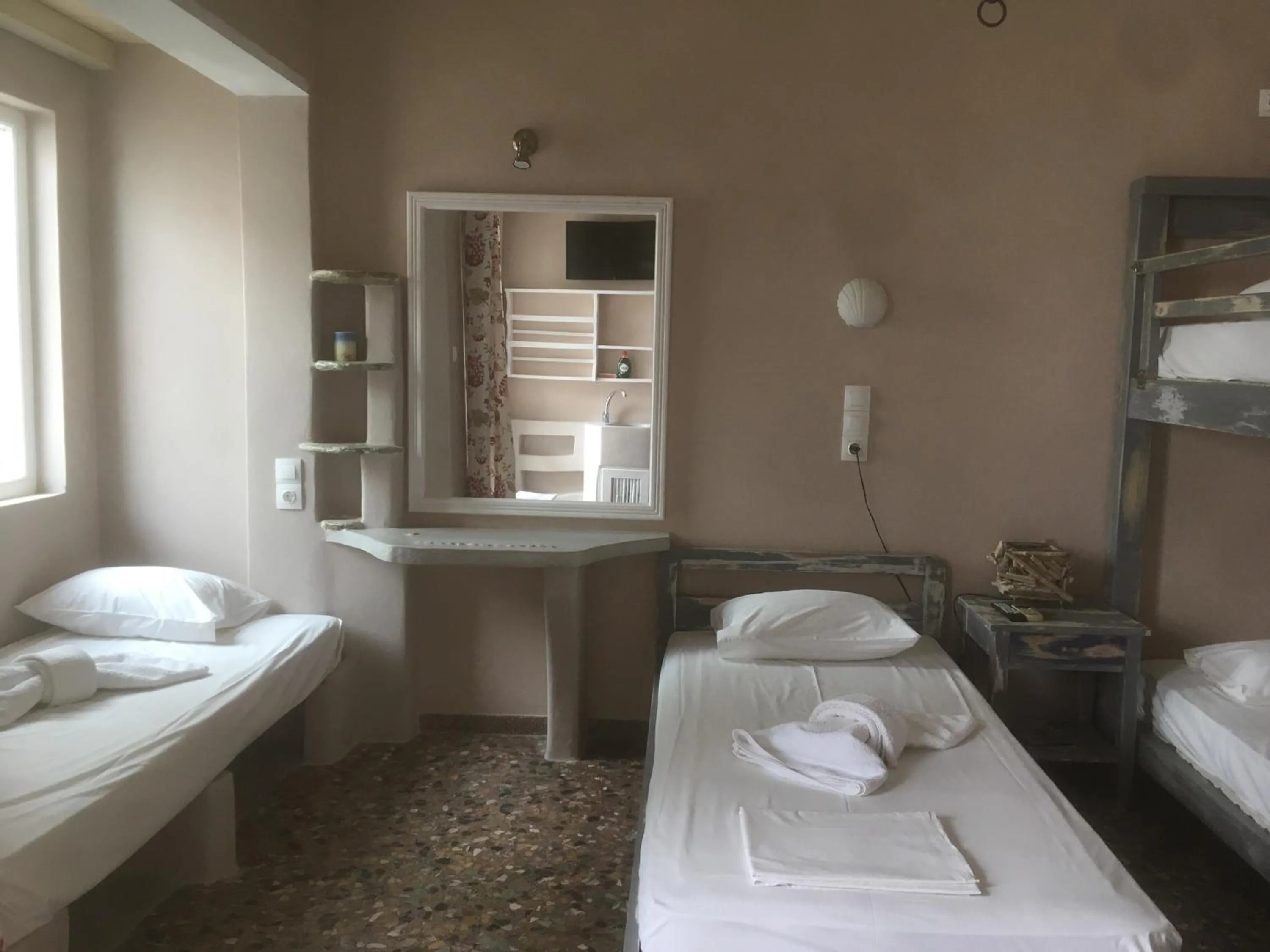 Bed in Afrodite Hotel