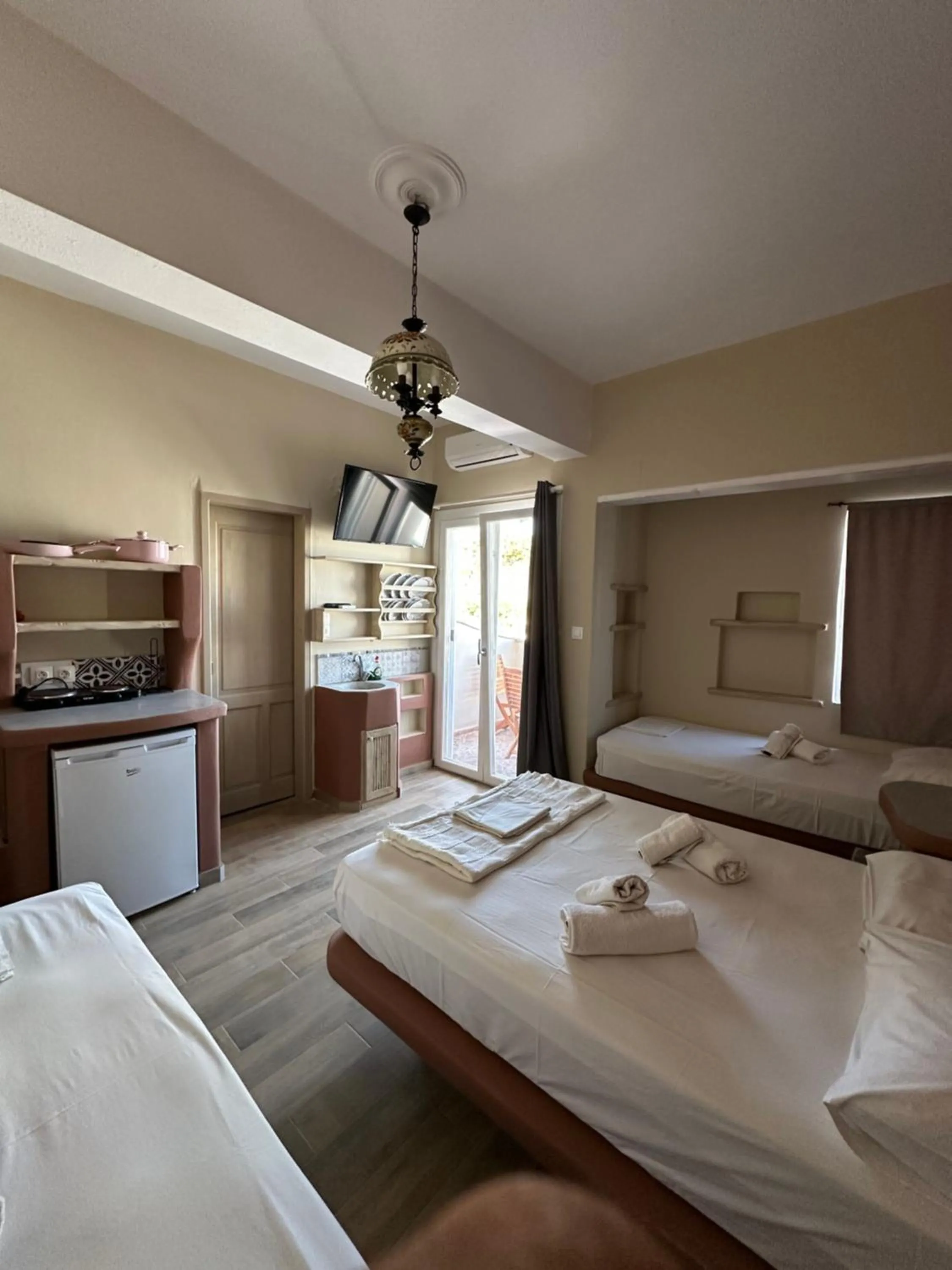 Bed in Afrodite Hotel