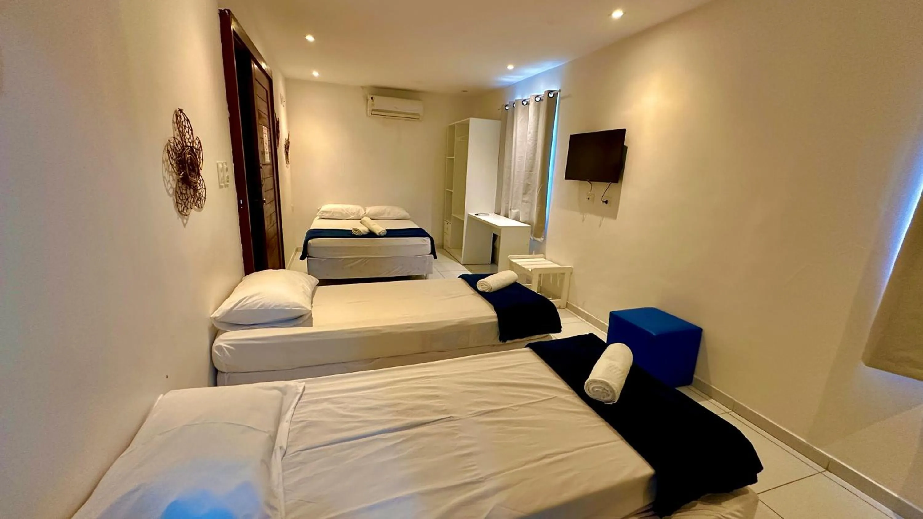 Bed in Paranambuca Pousada