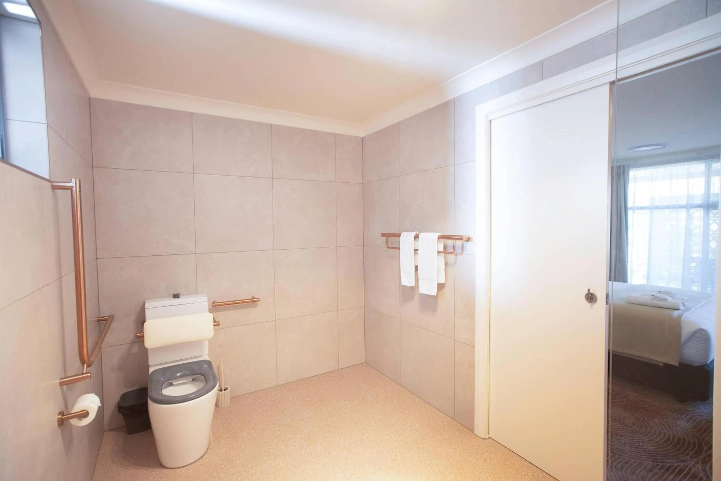 Bedroom in The Alluna Motel, an Ascend Collection Hotel