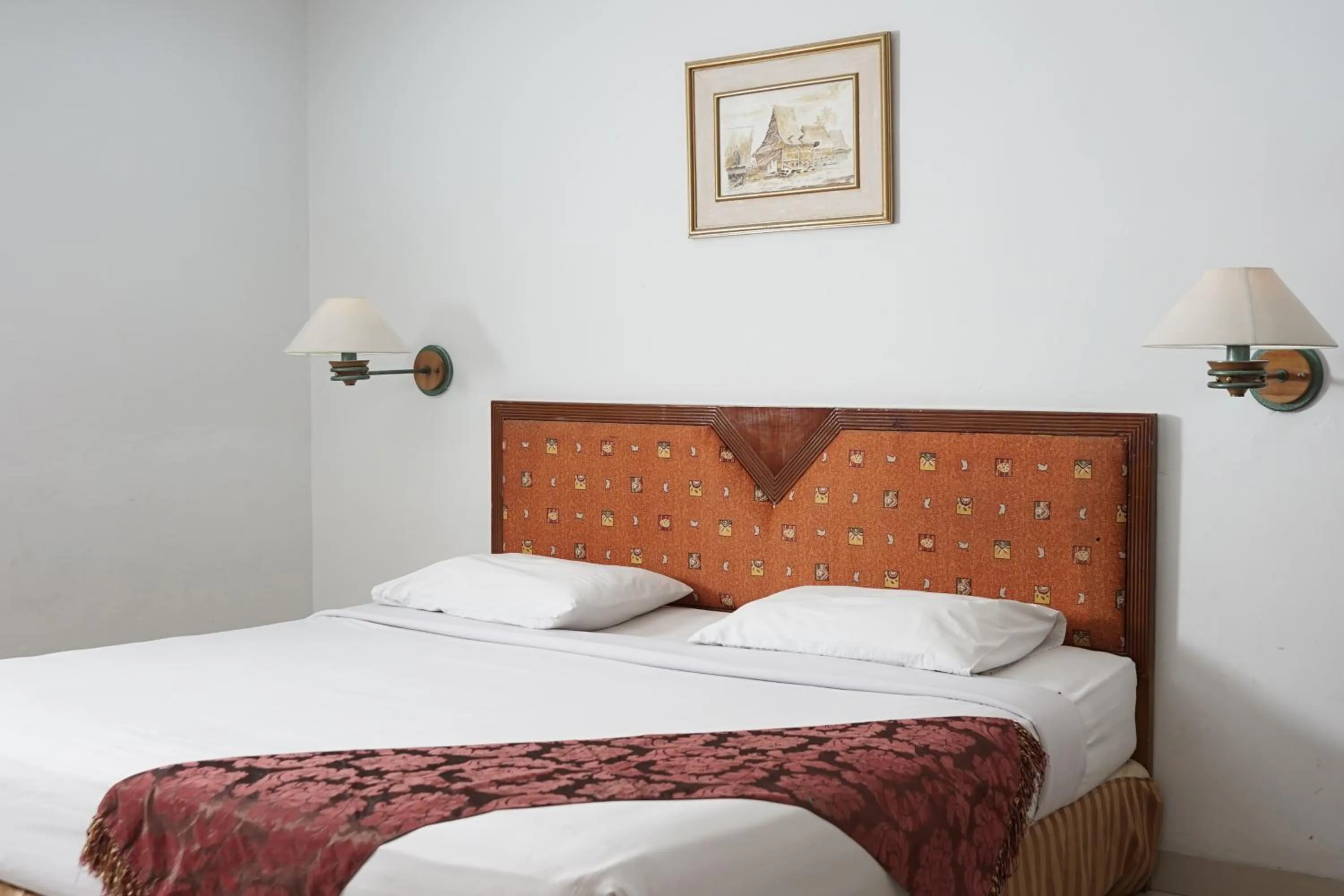 Bed in Rudang Hotel & Resort Berastagi