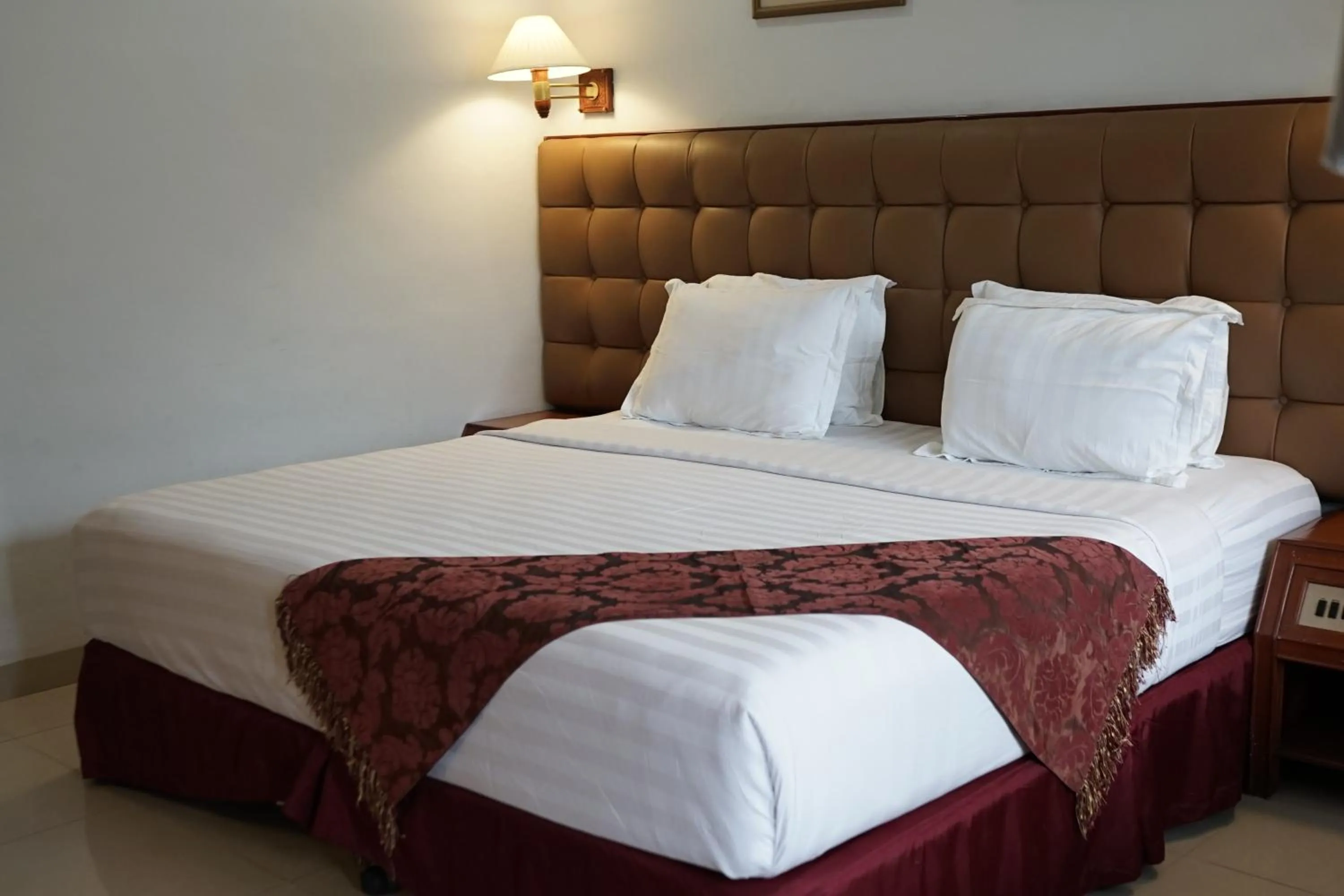 Bed in Rudang Hotel & Resort Berastagi