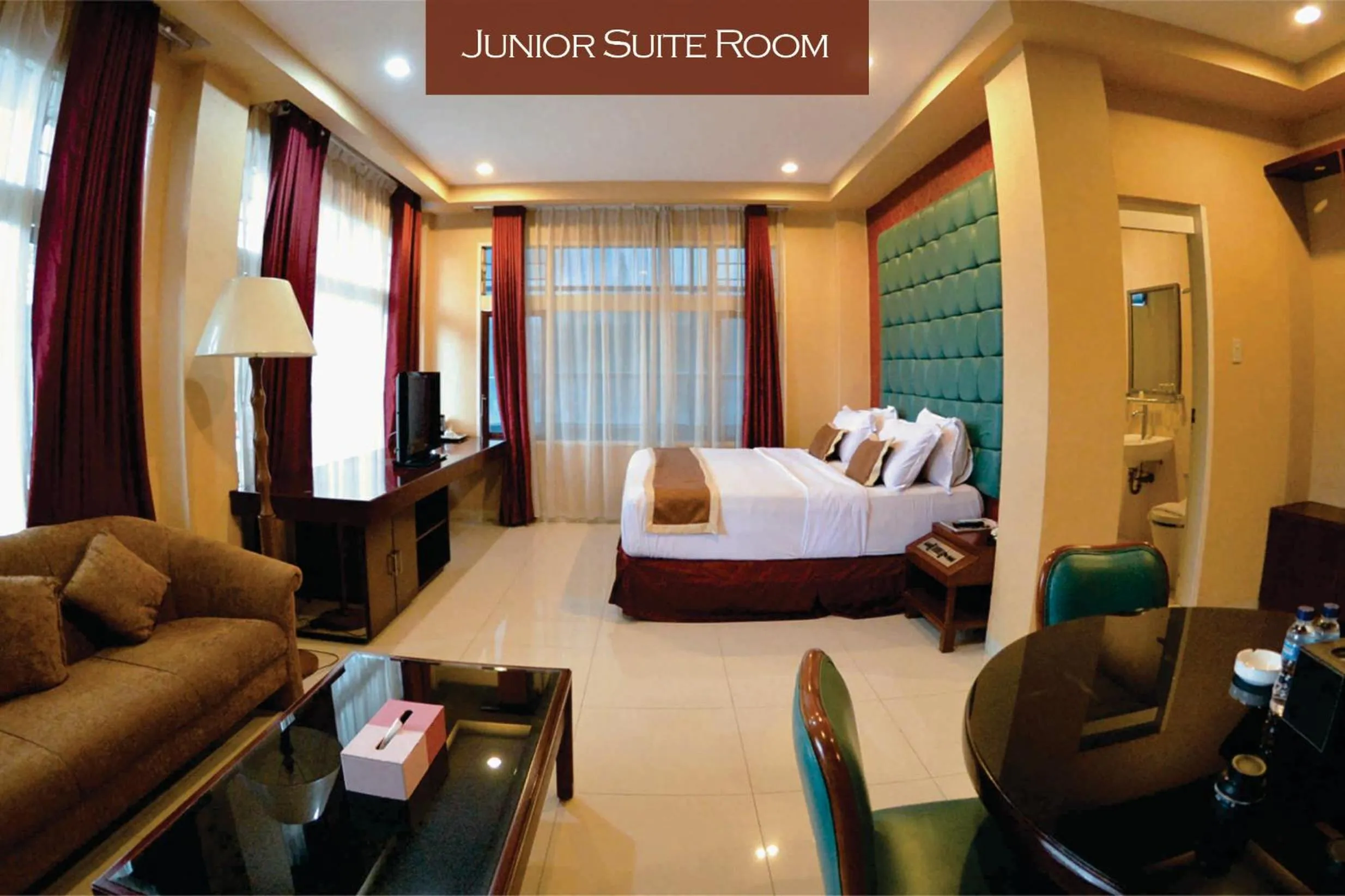 Bed in Rudang Hotel & Resort Berastagi