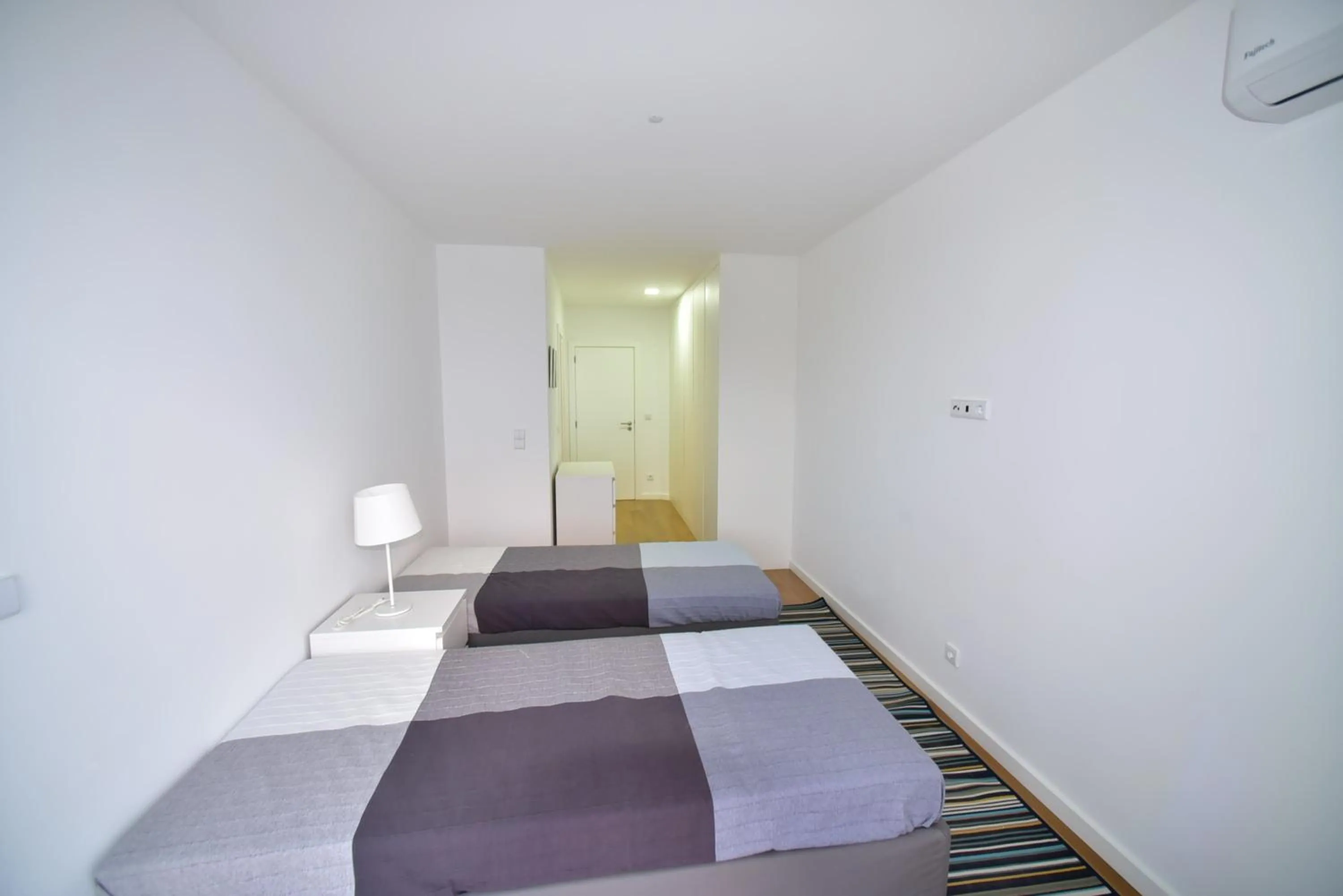 Bed in Xenon Urban Apartments