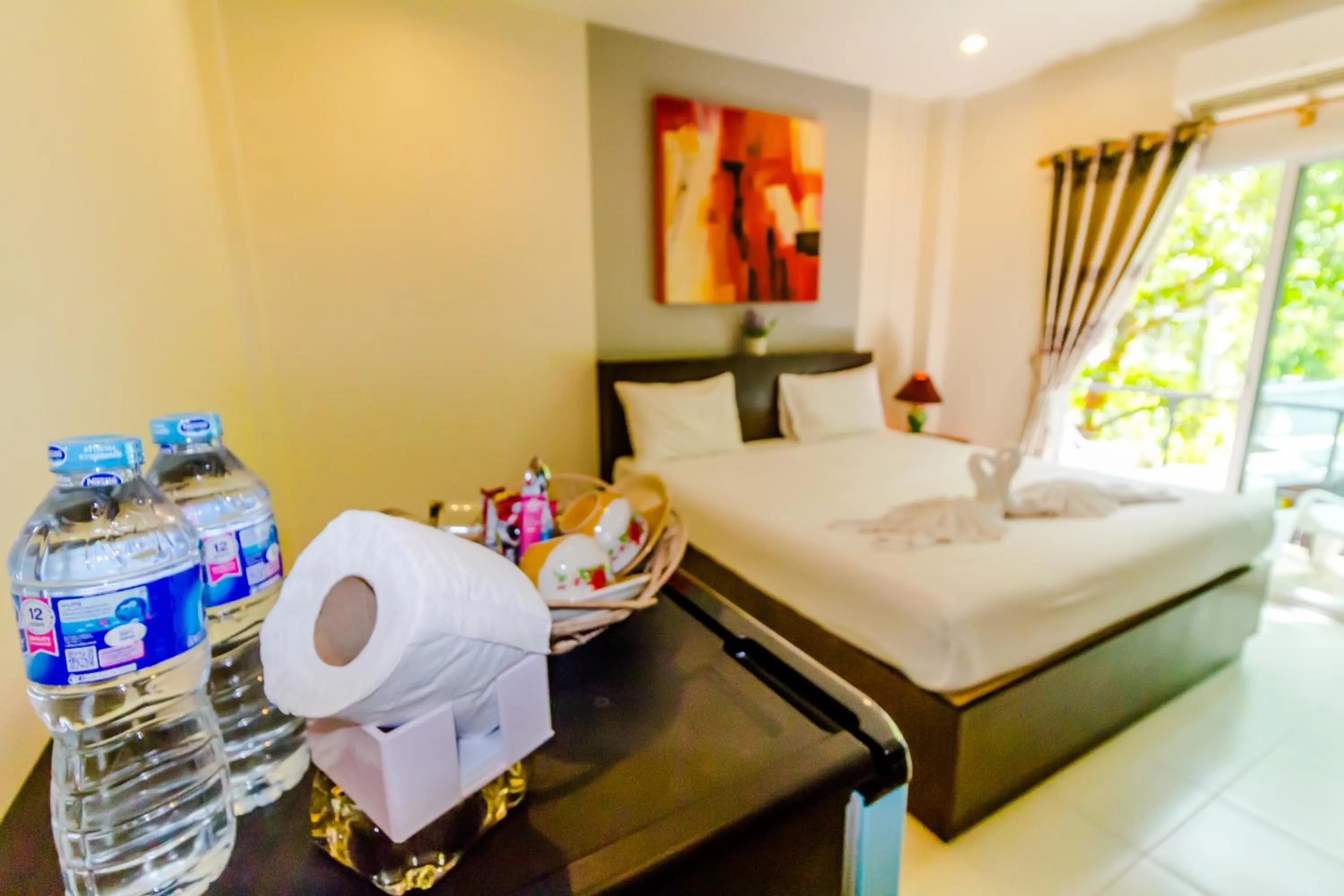 Photo of the whole room, Bed in Baan Yuyen Karon Guesthouse