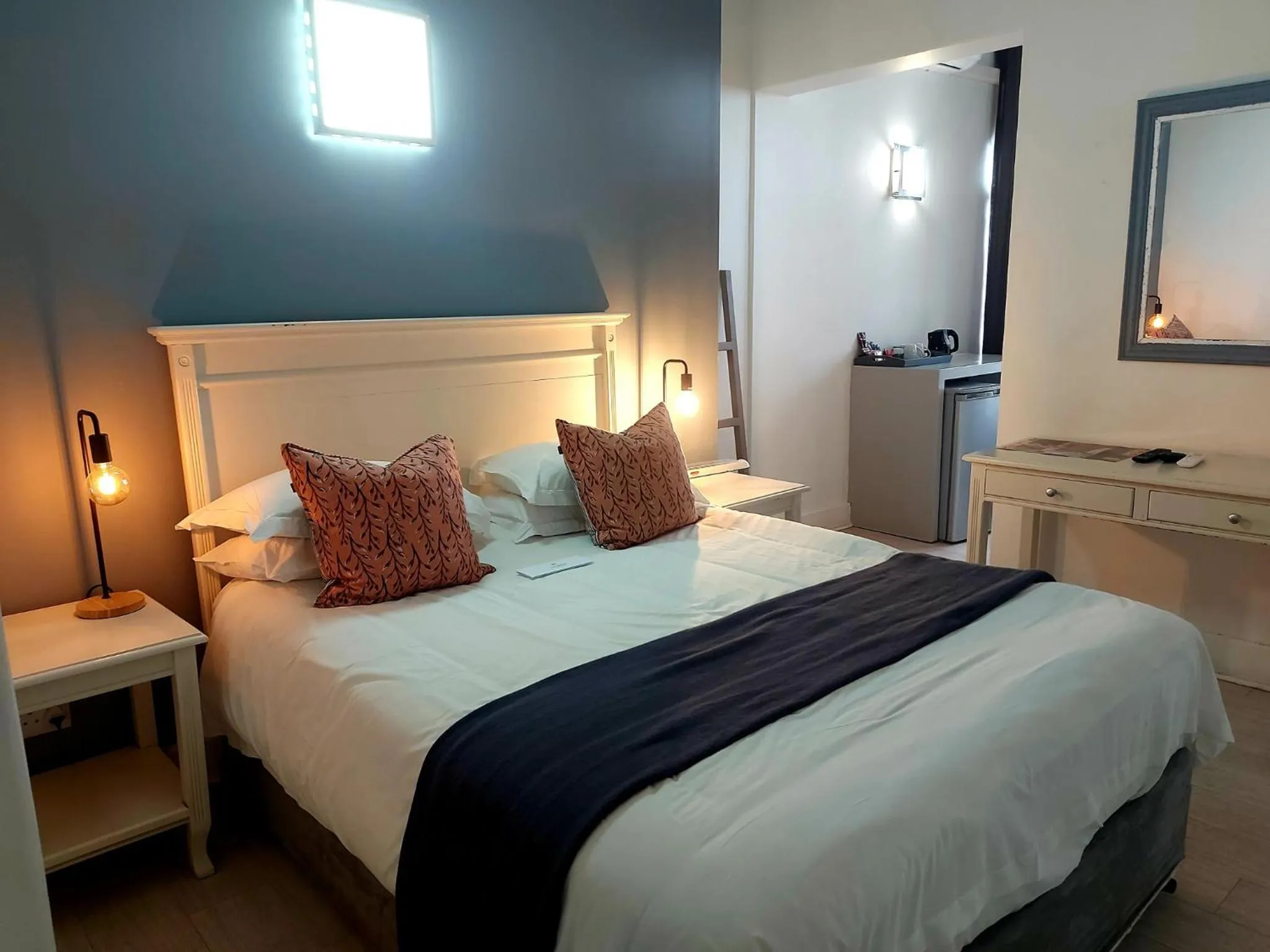 Bed in The Hampton Exclusive Guesthouse