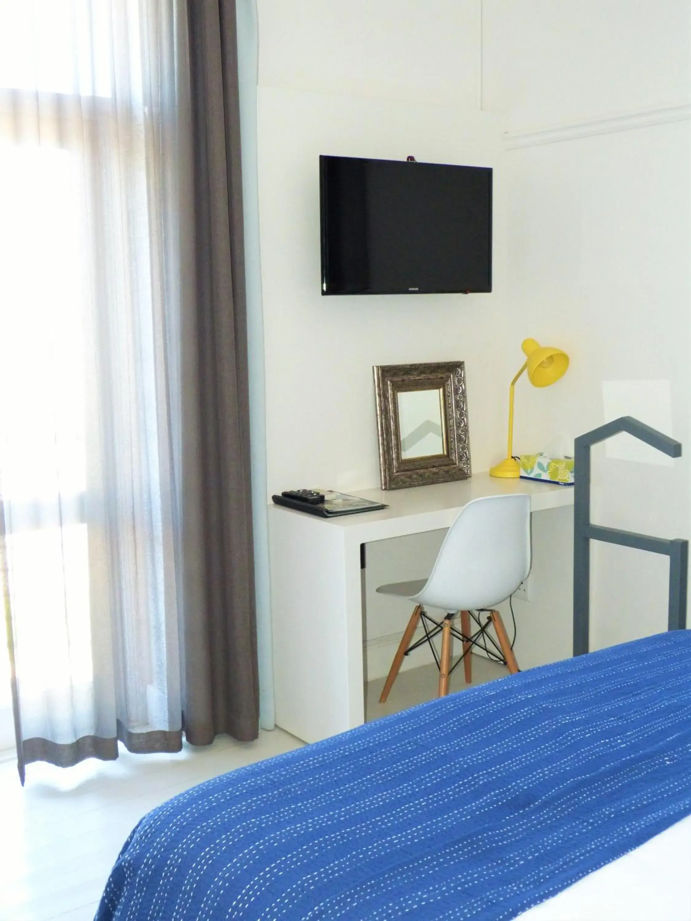 Bed in The Hampton Exclusive Guesthouse Bed in The Hampton Exclusive Guesthouse