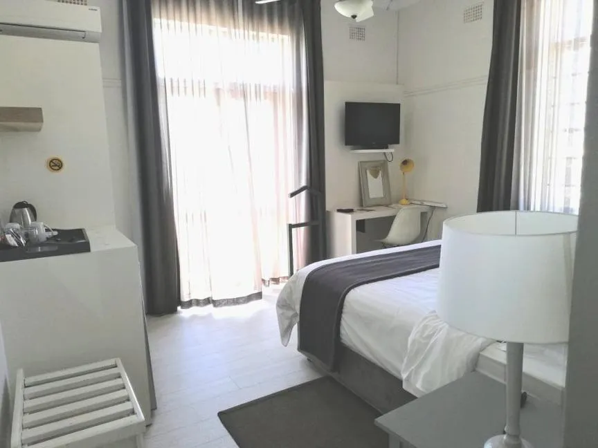 Coffee/tea facilities, Bed in The Hampton Exclusive Guesthouse