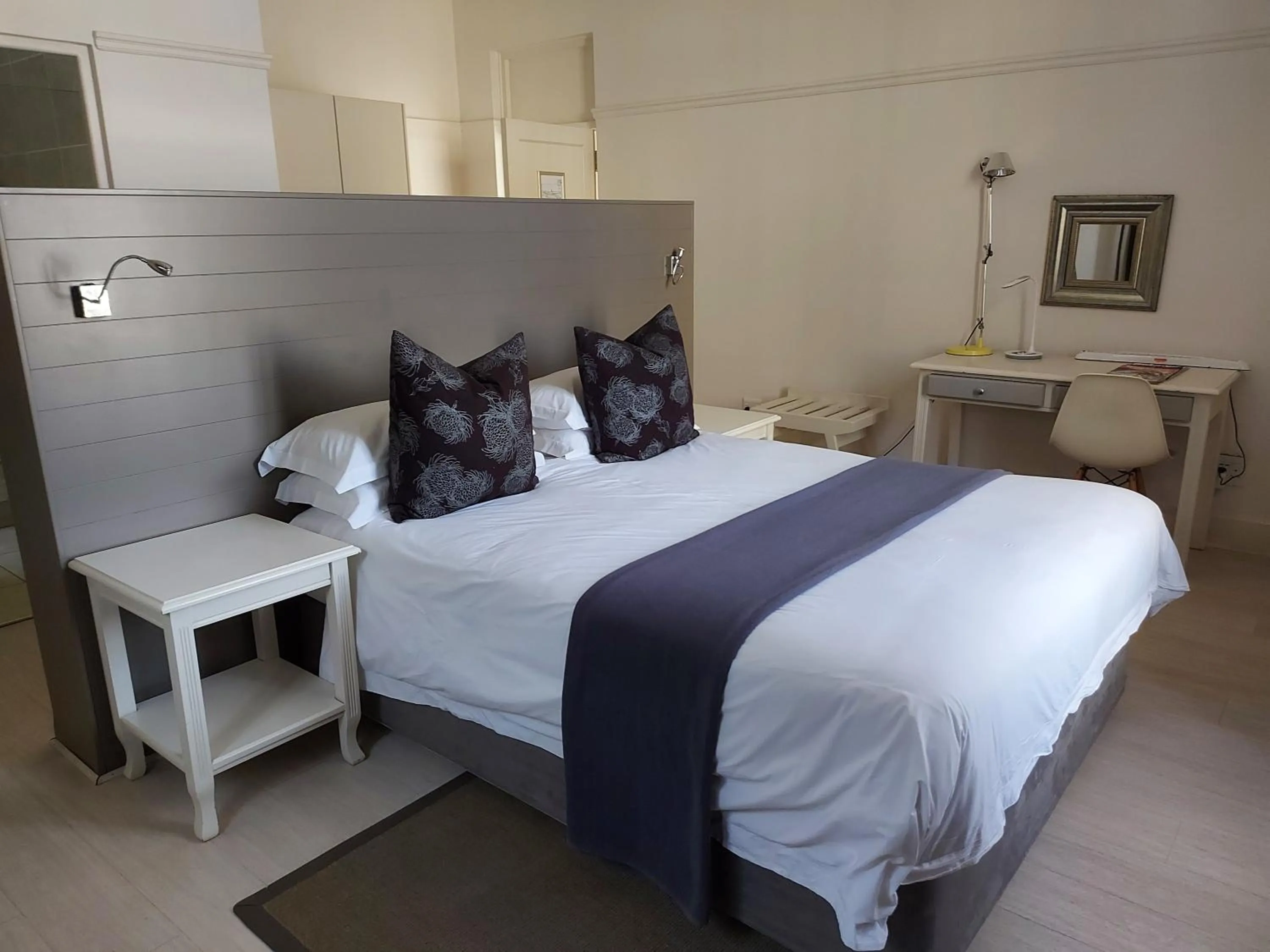 Bed in The Hampton Exclusive Guesthouse