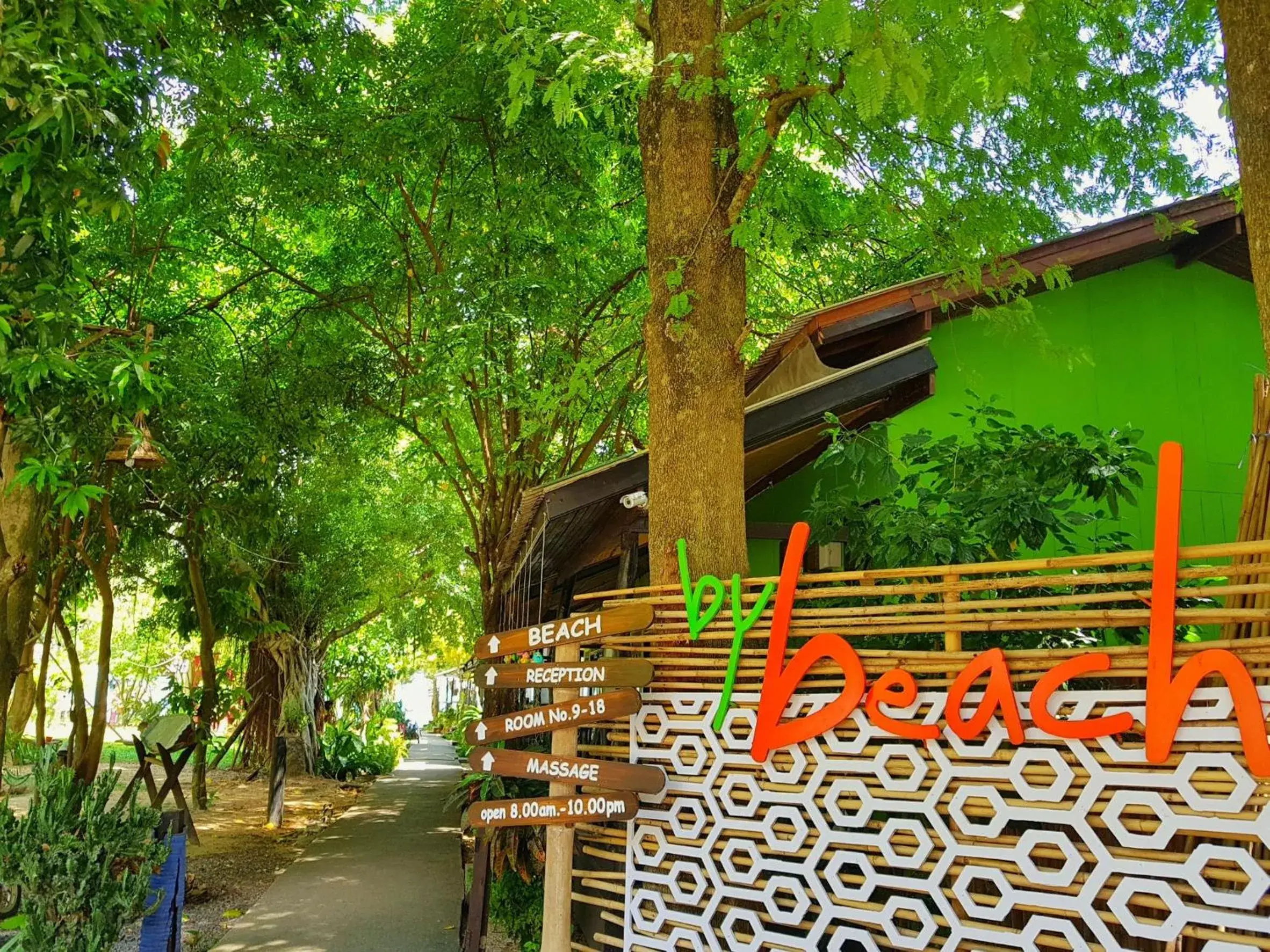 Property logo or sign, Property Building in By Beach Resort Property logo or sign, Property Building in By Beach Resort