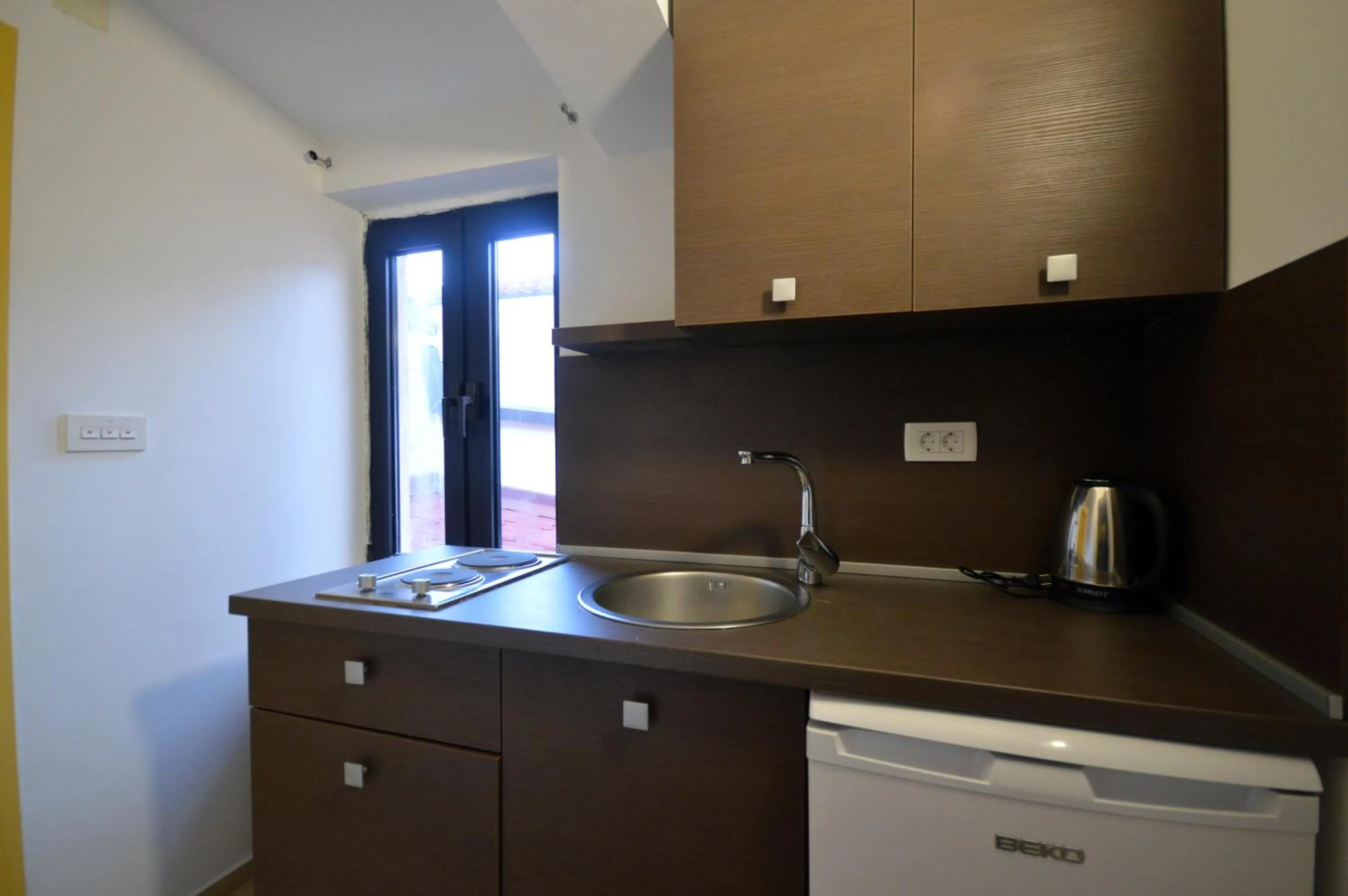 Kitchen or kitchenette in Di Angolo Apartments