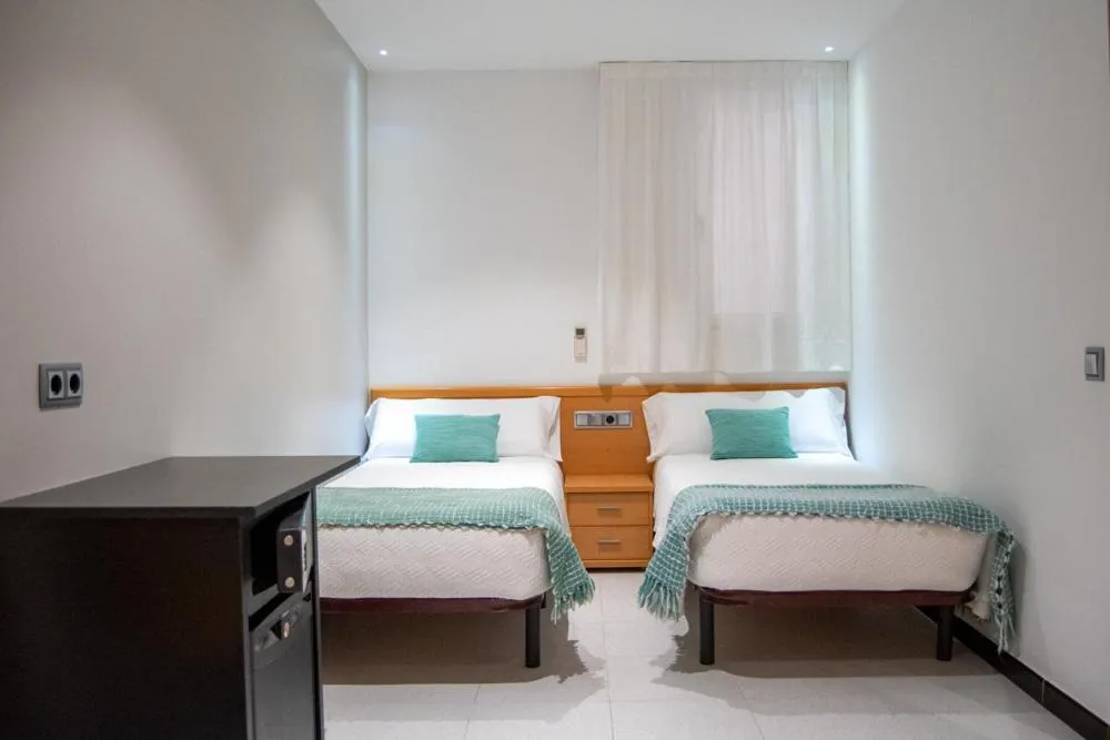 Photo of the whole room, Bed in Hostal Apolo