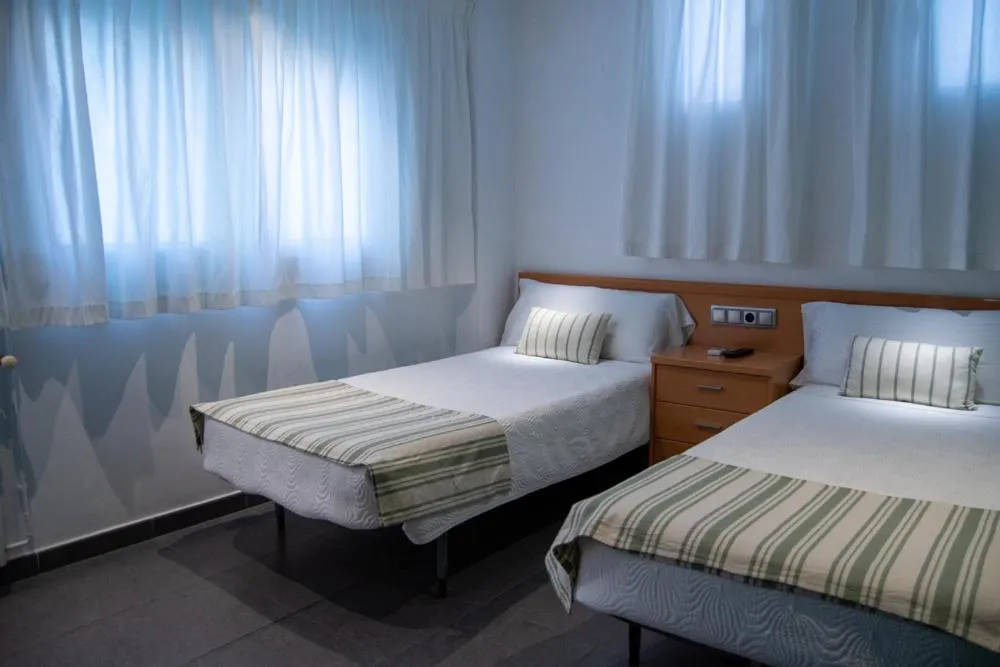 Photo of the whole room, Bed in Hostal Apolo