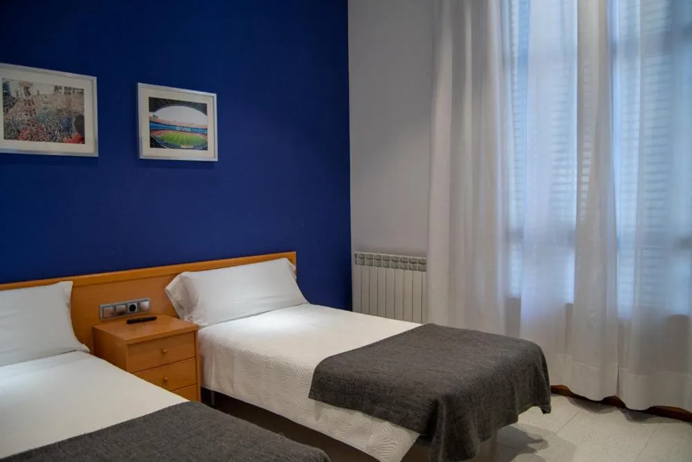 Photo of the whole room, Bed in Hostal Apolo