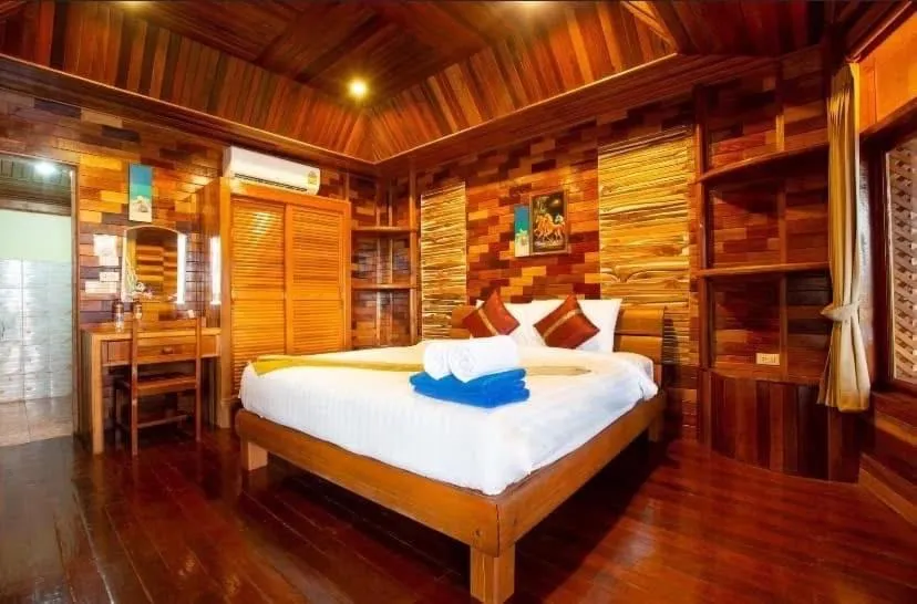 Bed in Sangsawan Palace Khaolak Resort