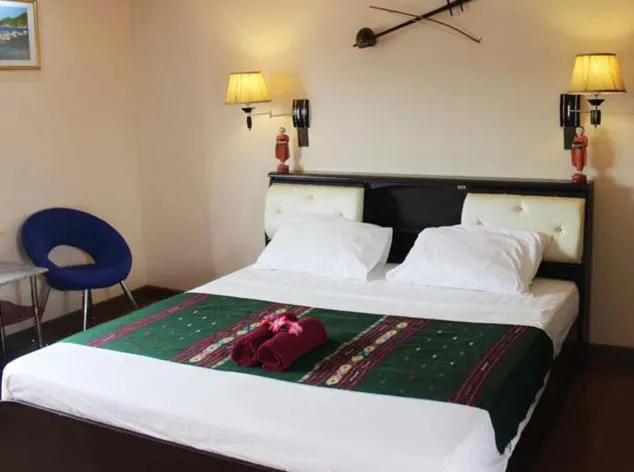 Bed in Udon Thai House Resort & Hotel