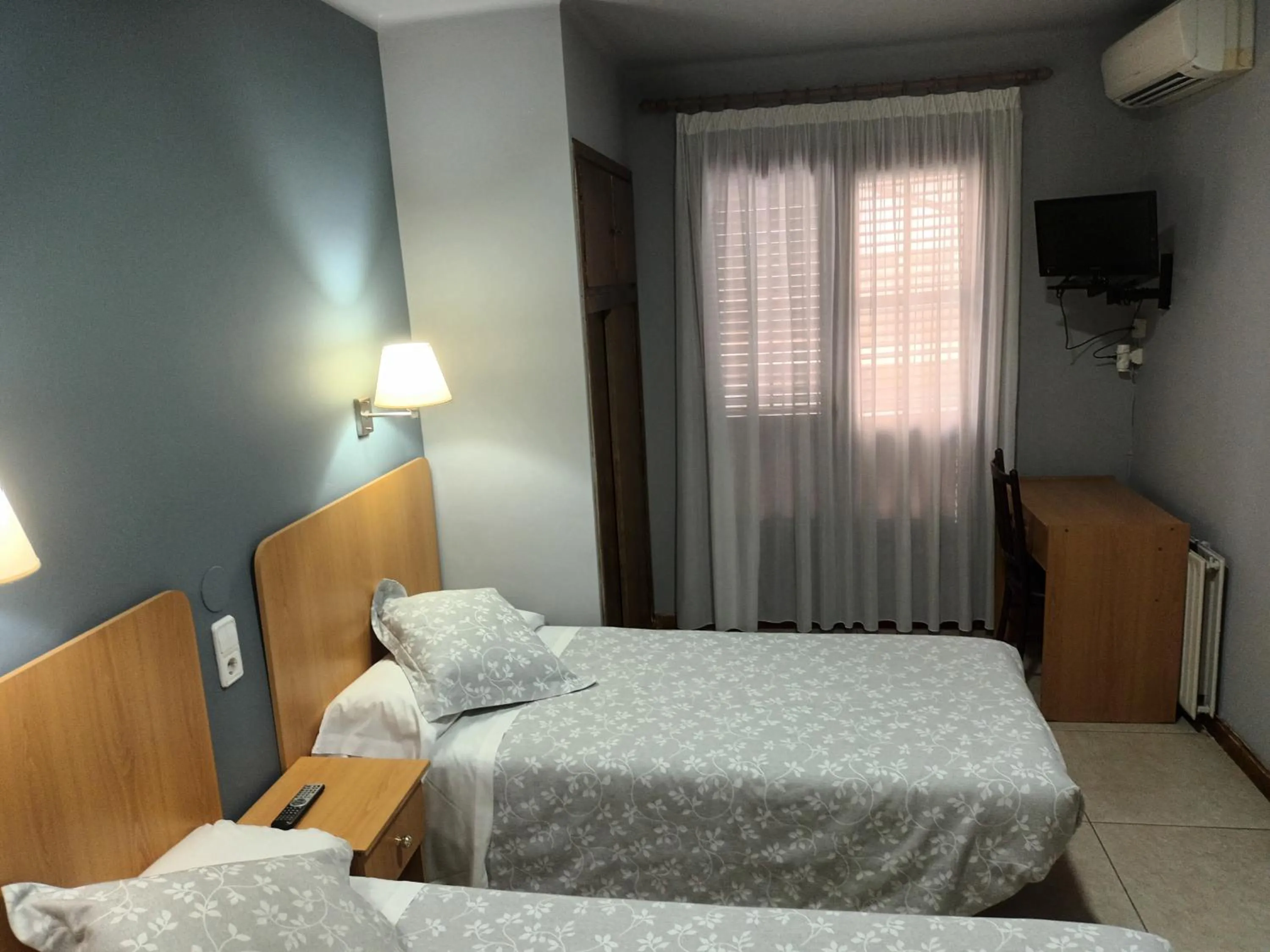 Bed in Hostal Can Jaume