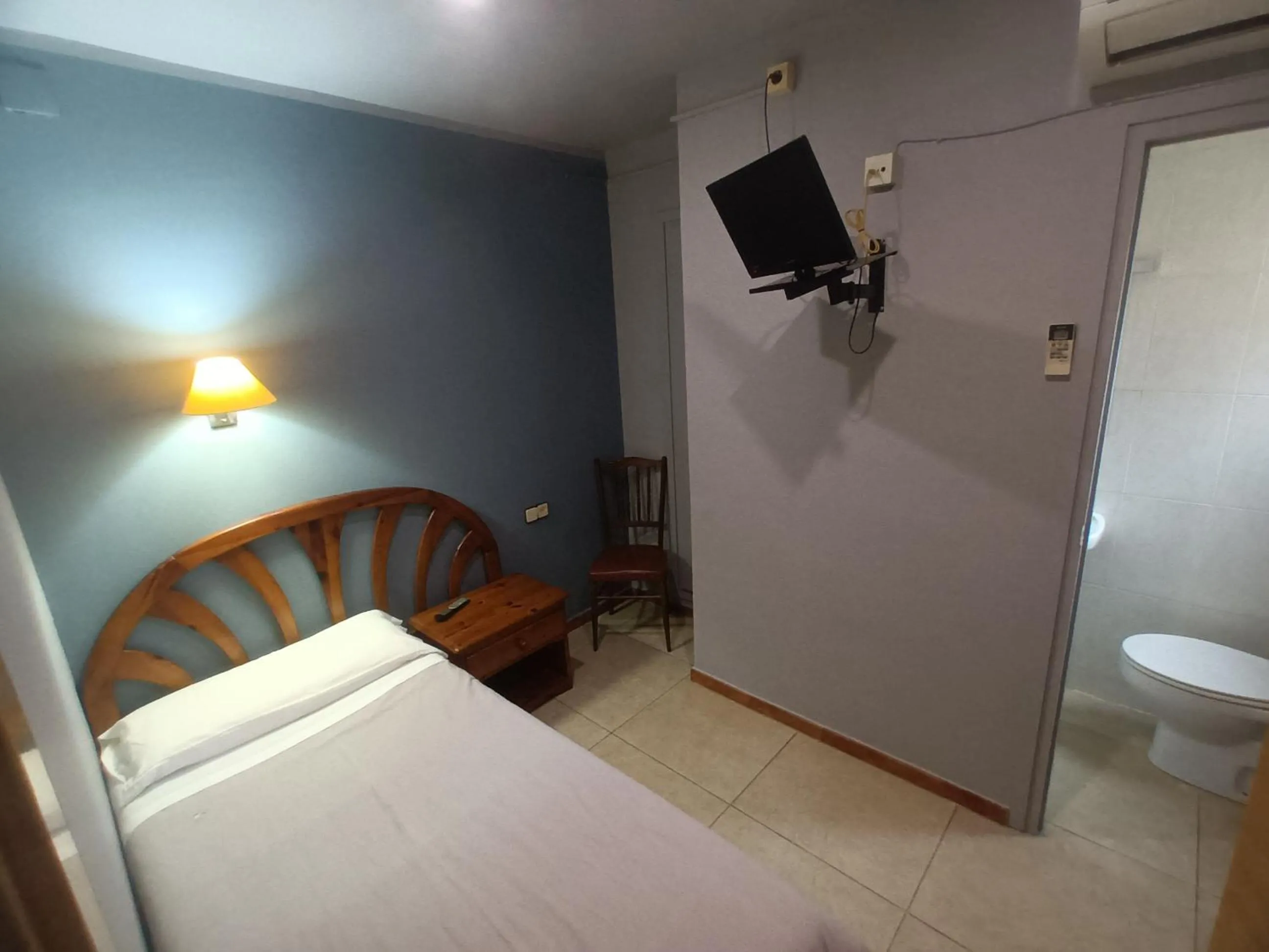 Bed in Hostal Can Jaume
