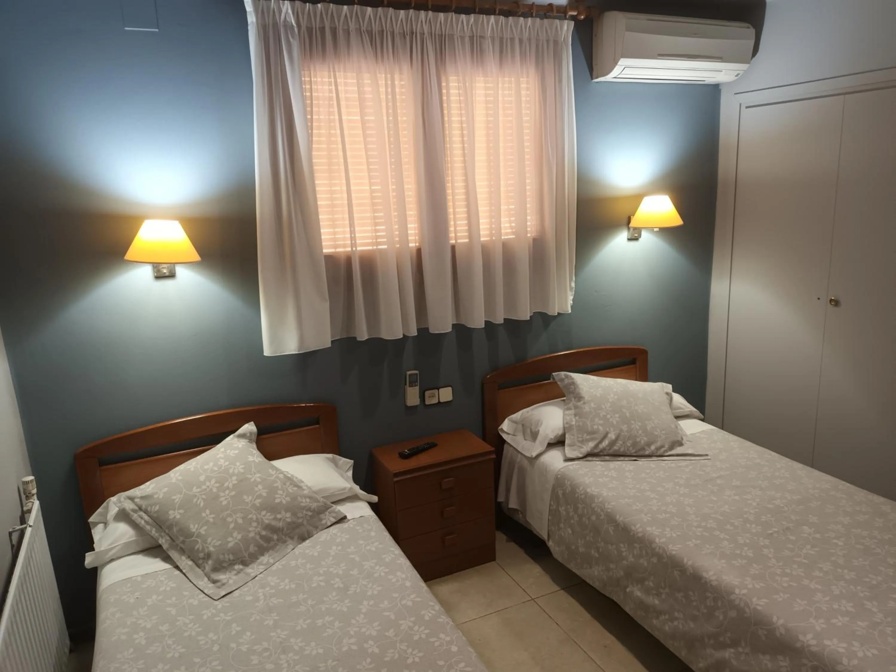 Bed in Hostal Can Jaume