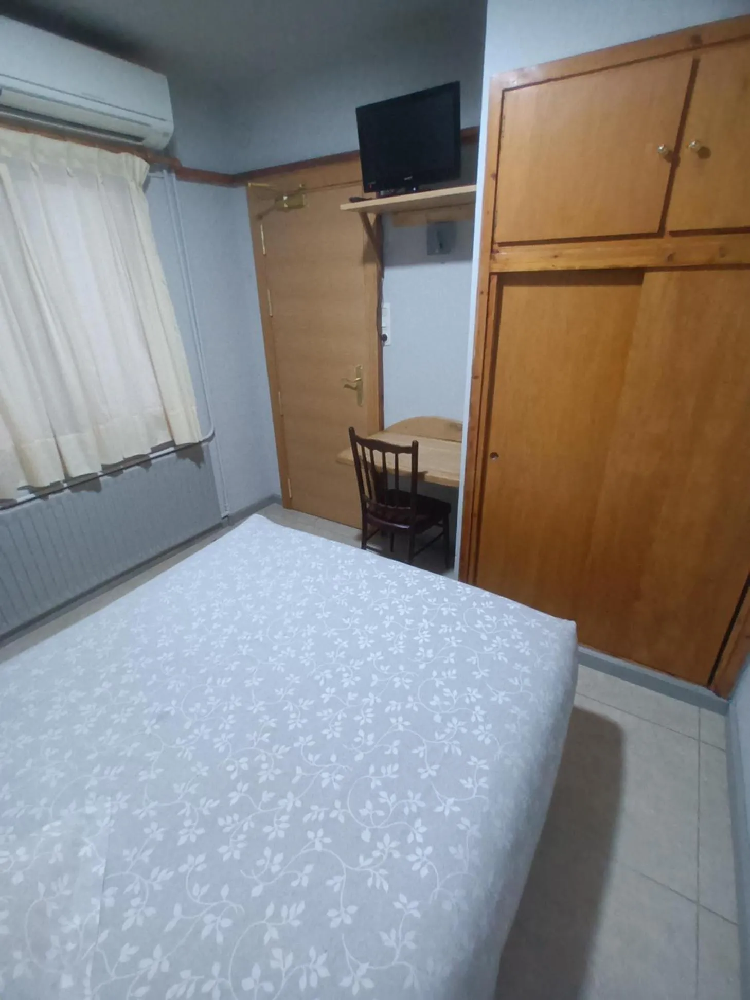 Bed in Hostal Can Jaume