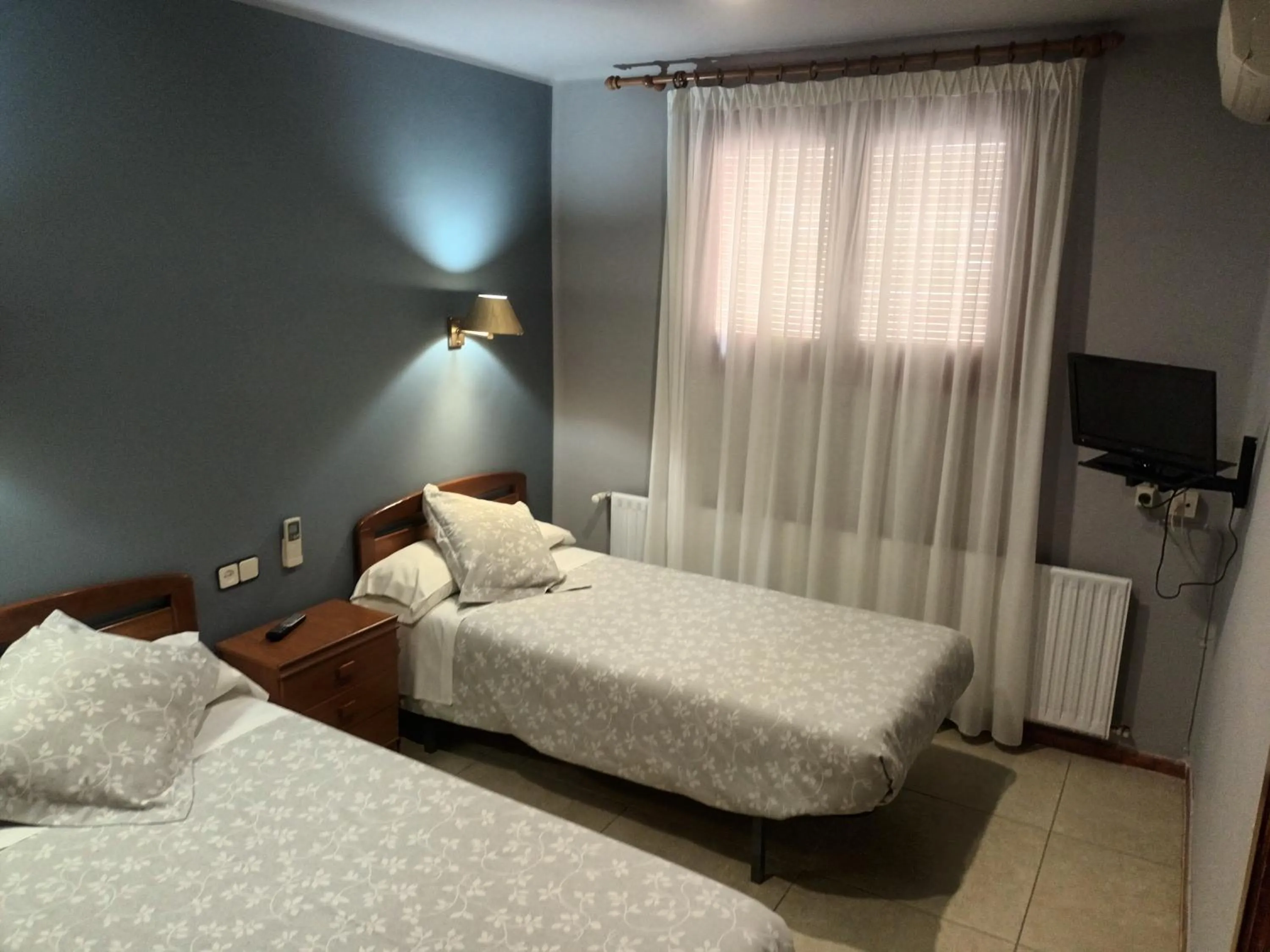 Bed in Hostal Can Jaume