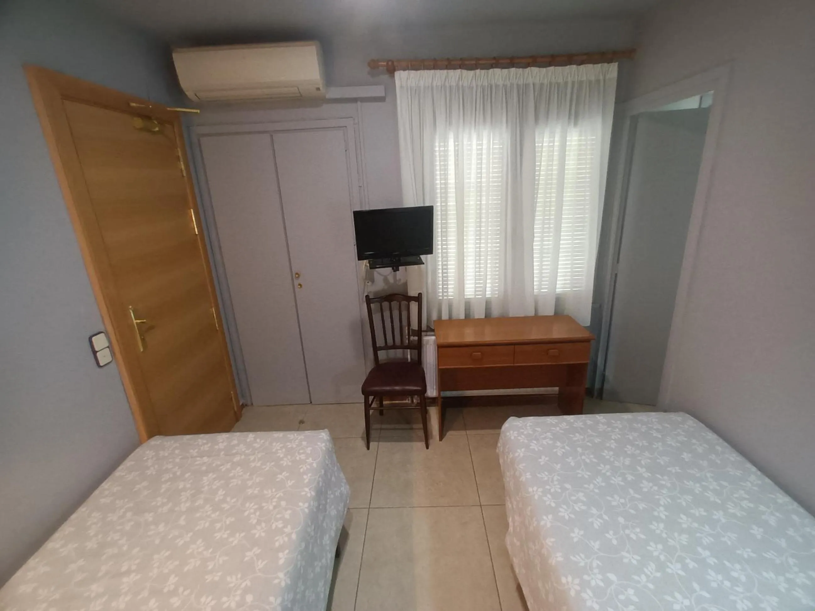 Bed in Hostal Can Jaume