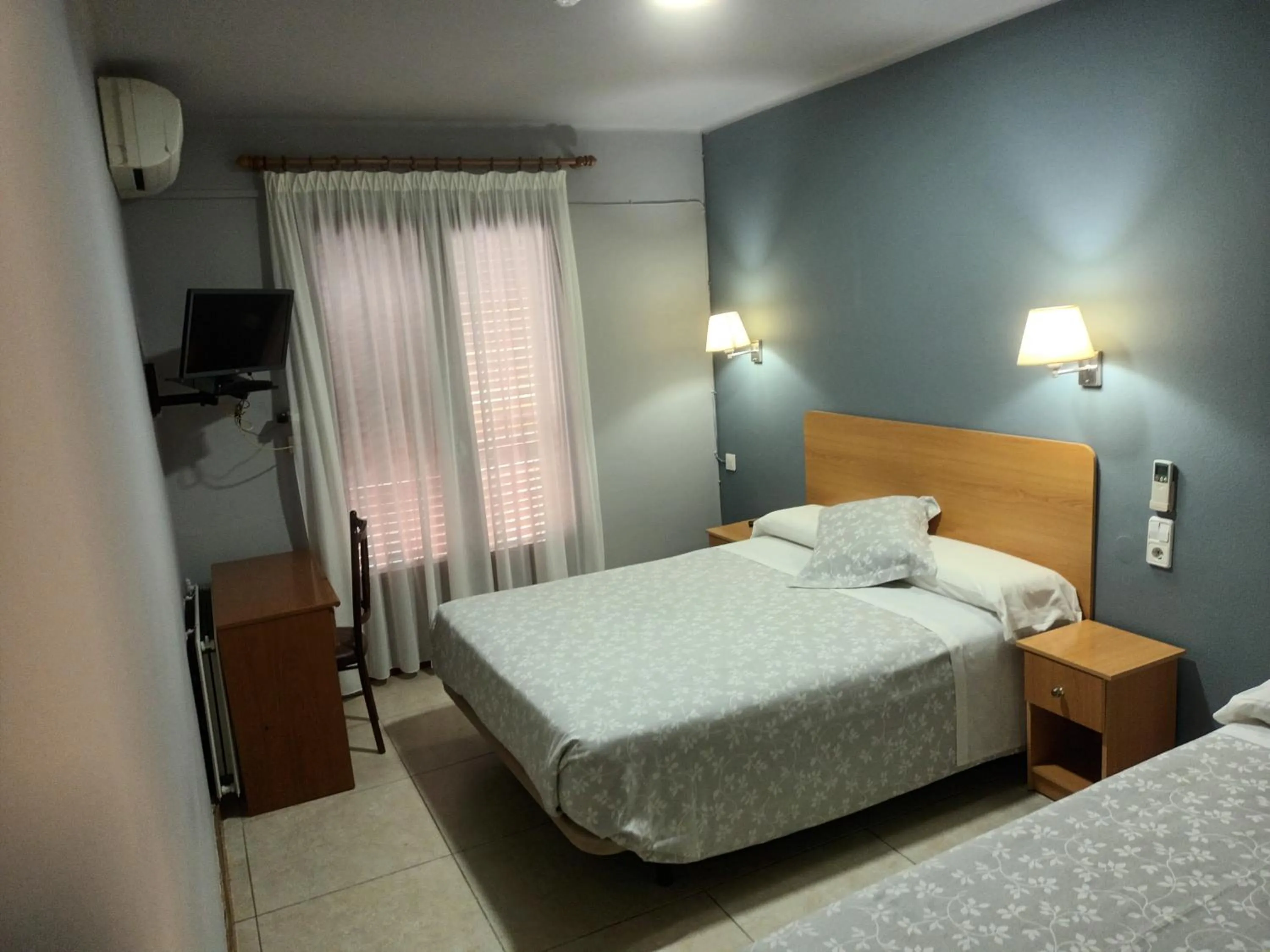 Bed in Hostal Can Jaume