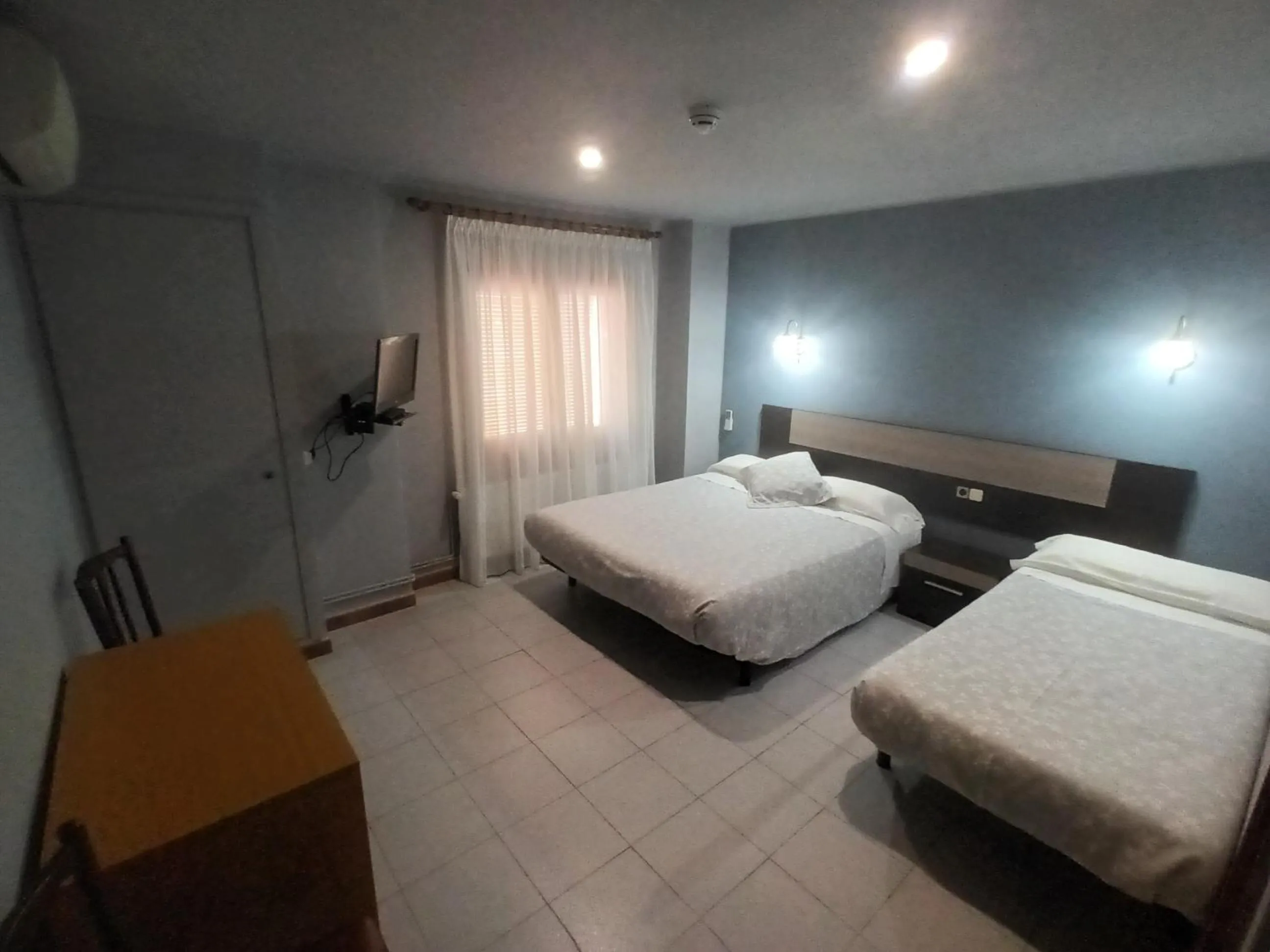 Bed in Hostal Can Jaume