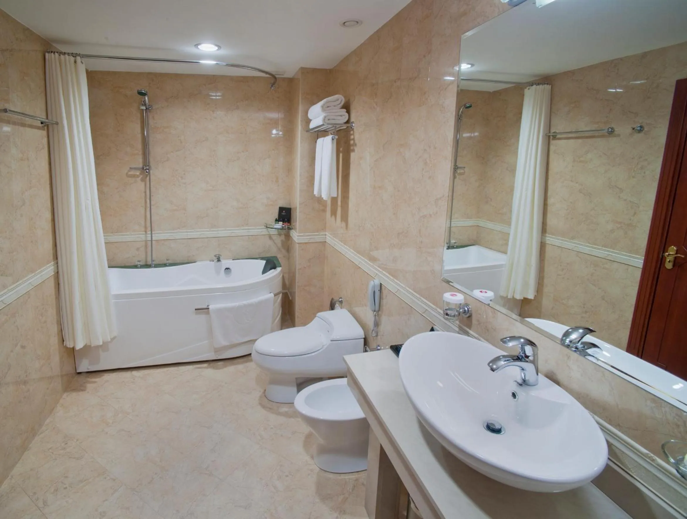 Shower in Ramada Plaza by Wyndham Gence